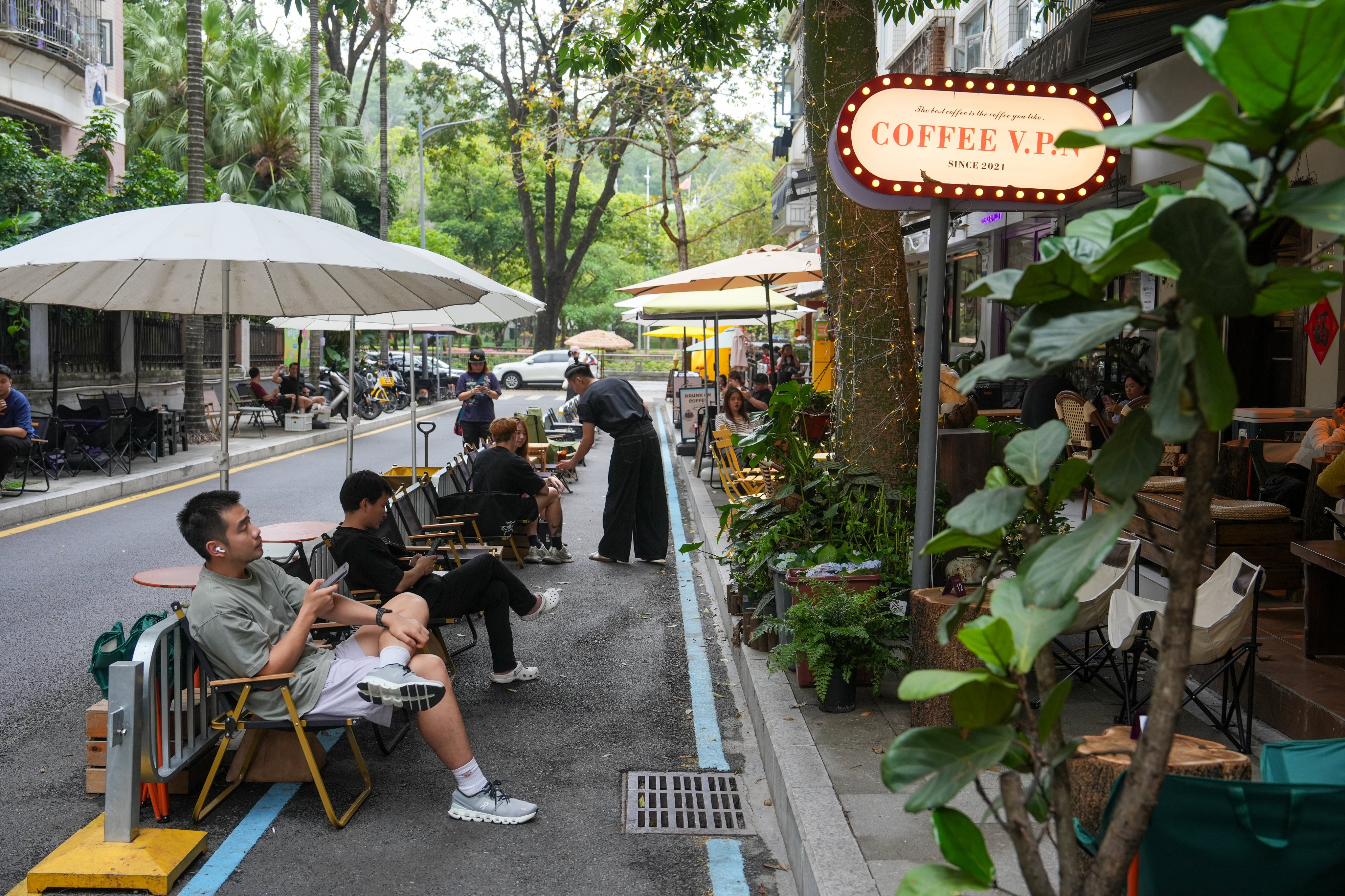 Many Hongkongers now prefer to spend leisure time in Shenzhen, which offers attractive places to relax like Jingtian Coffee Street, April 7. Photo: Sun Yeung