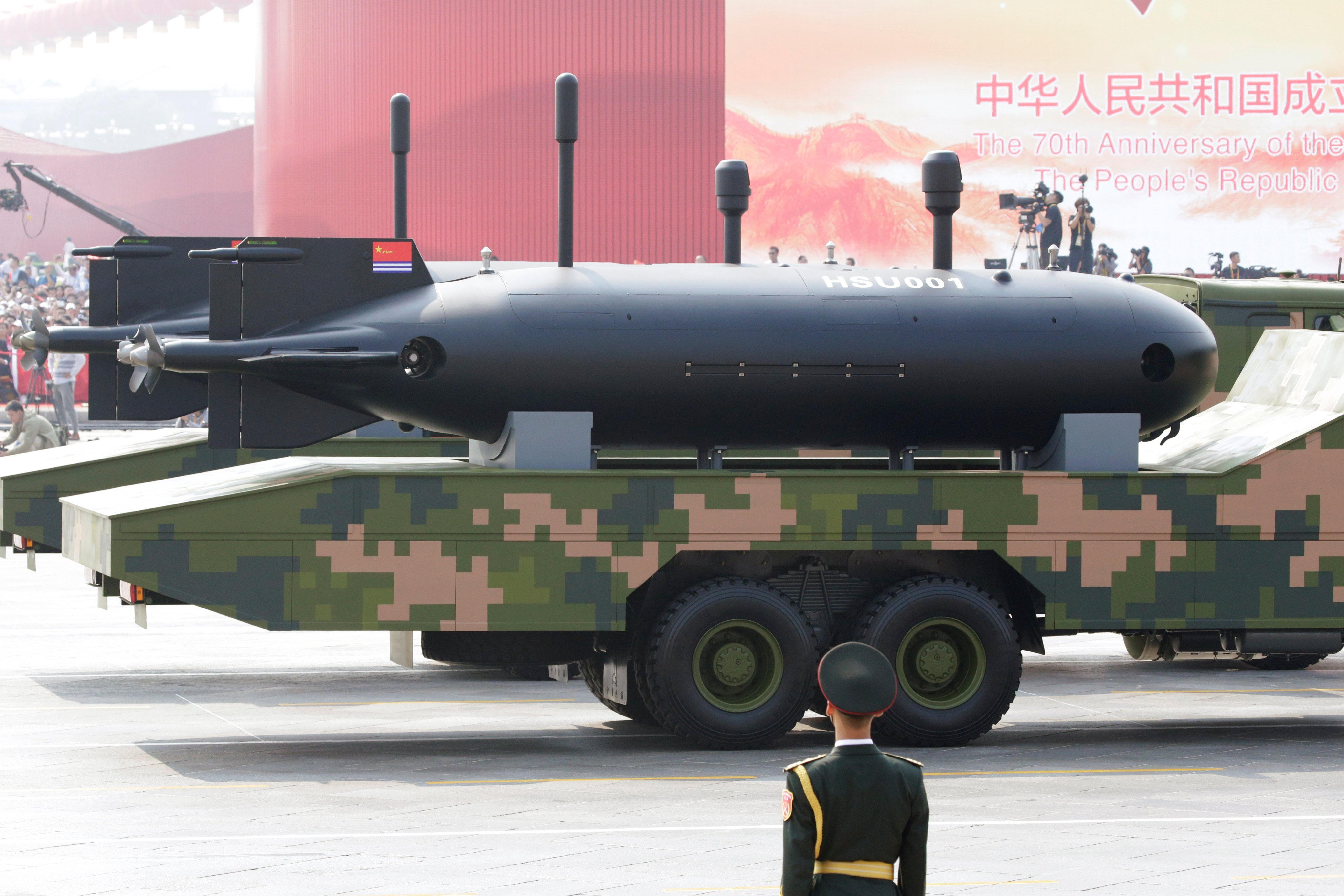 scmp.com - Holly Chik - Chinese coastguard proposes turning South China Sea isles into robotic fortress