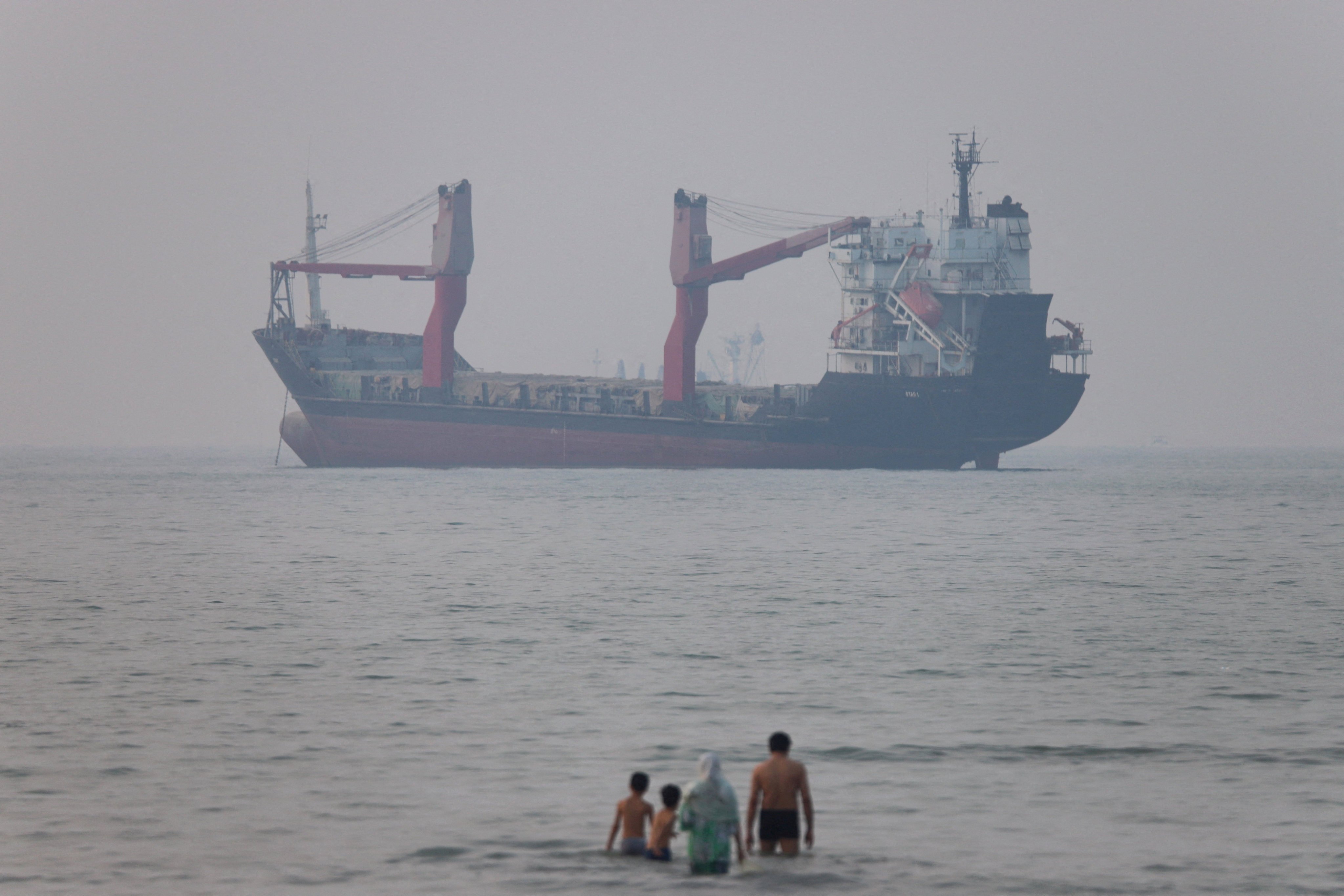 A vessel is seen in the Strait of Hormuz near the beach of Bandar Abbas, Iran, in June. Photo: ISNA/WANA via Reuters