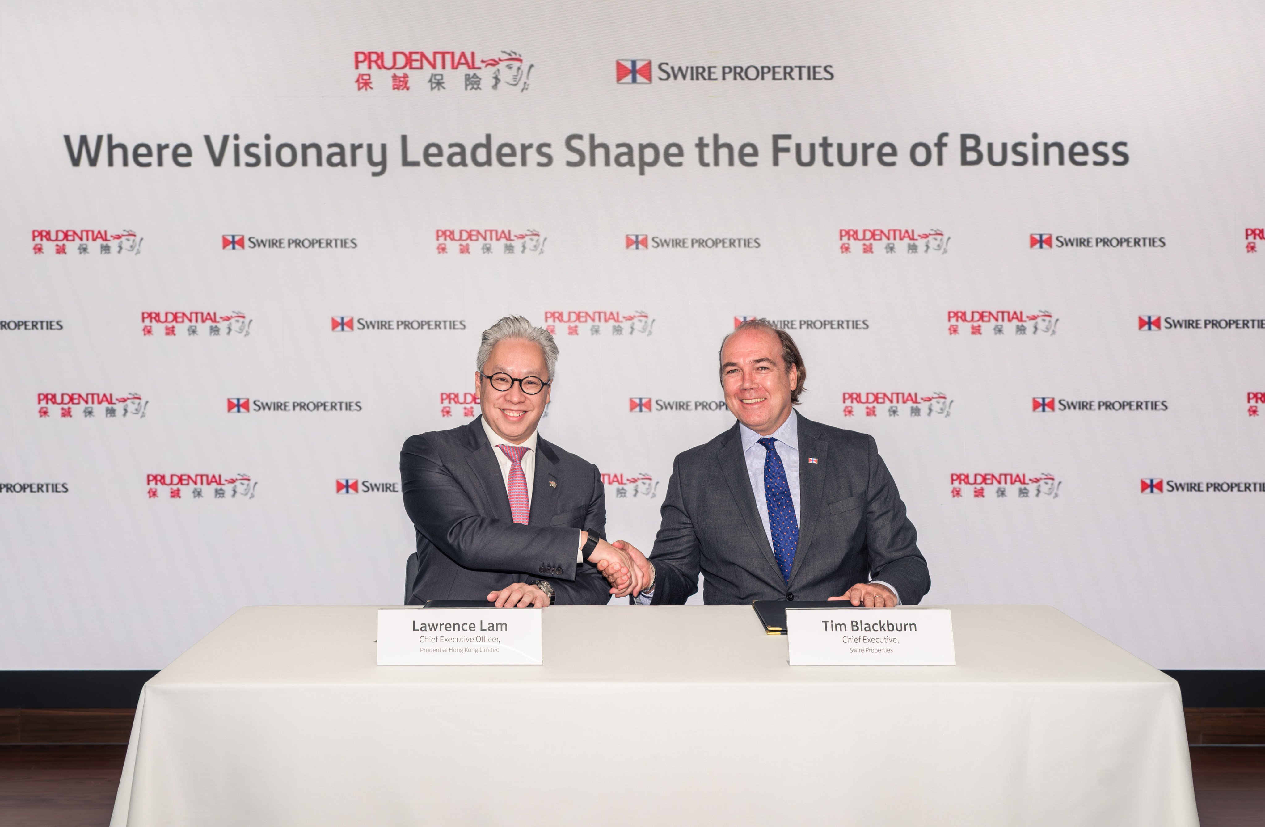 The new lease agreement was signed by Tim Blackburn, Chief Executive of Swire Properties (right), and Lawrence Lam, Chief Executive Officer of Prudential Hong Kong Limited. Photo: handout