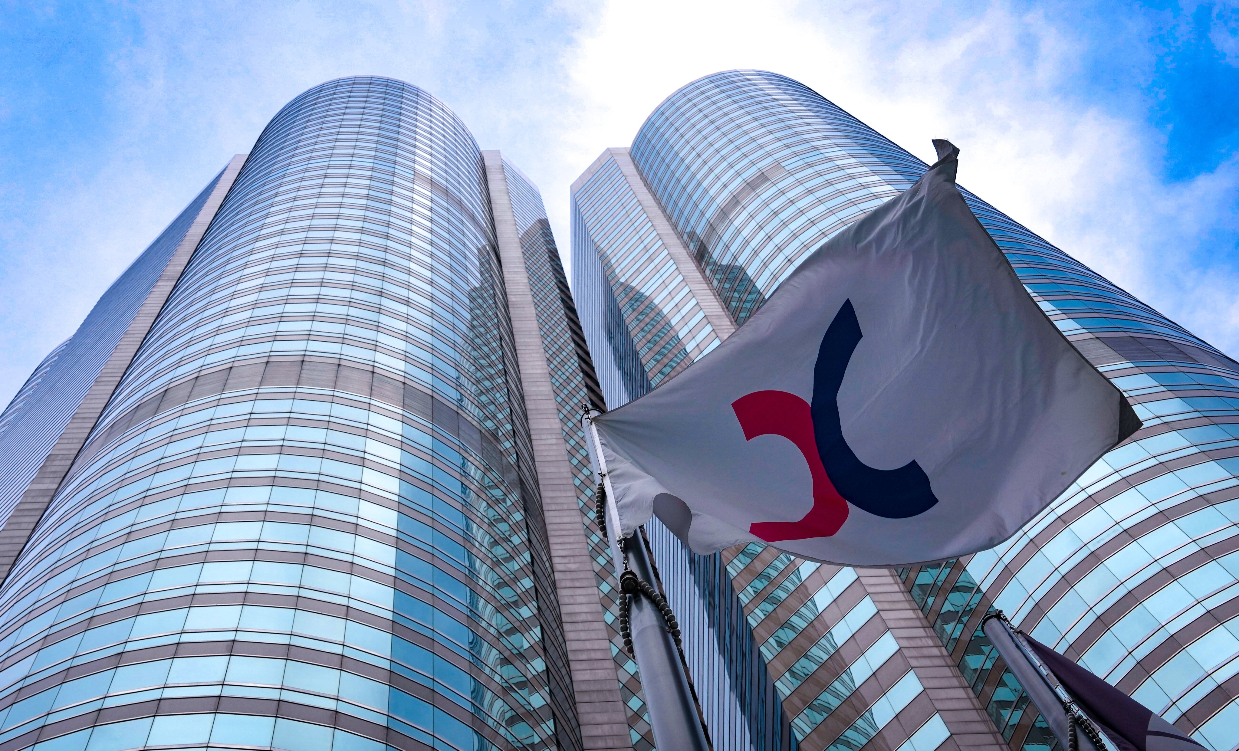 A flag showing the logo of Hong Kong Exchanges and Clearing flies outside Exchange Square in Central, where the company has its headquarters, on July 21. Photo: Jelly Tse