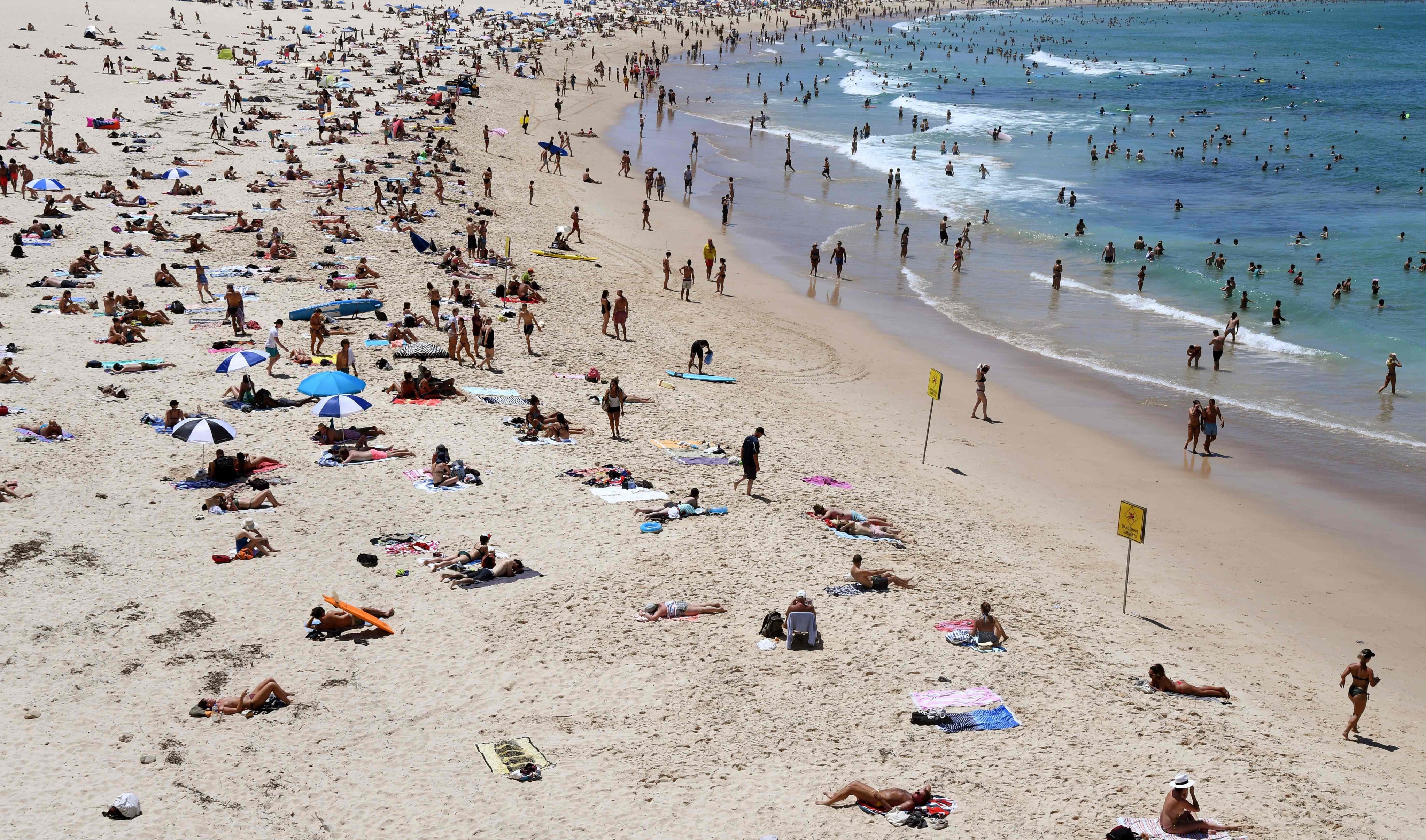 Beachgoers relaxing on Sydney’s Bondi Beach. Melanoma is one of the deadliest forms of skin cancer. Photo: AFP