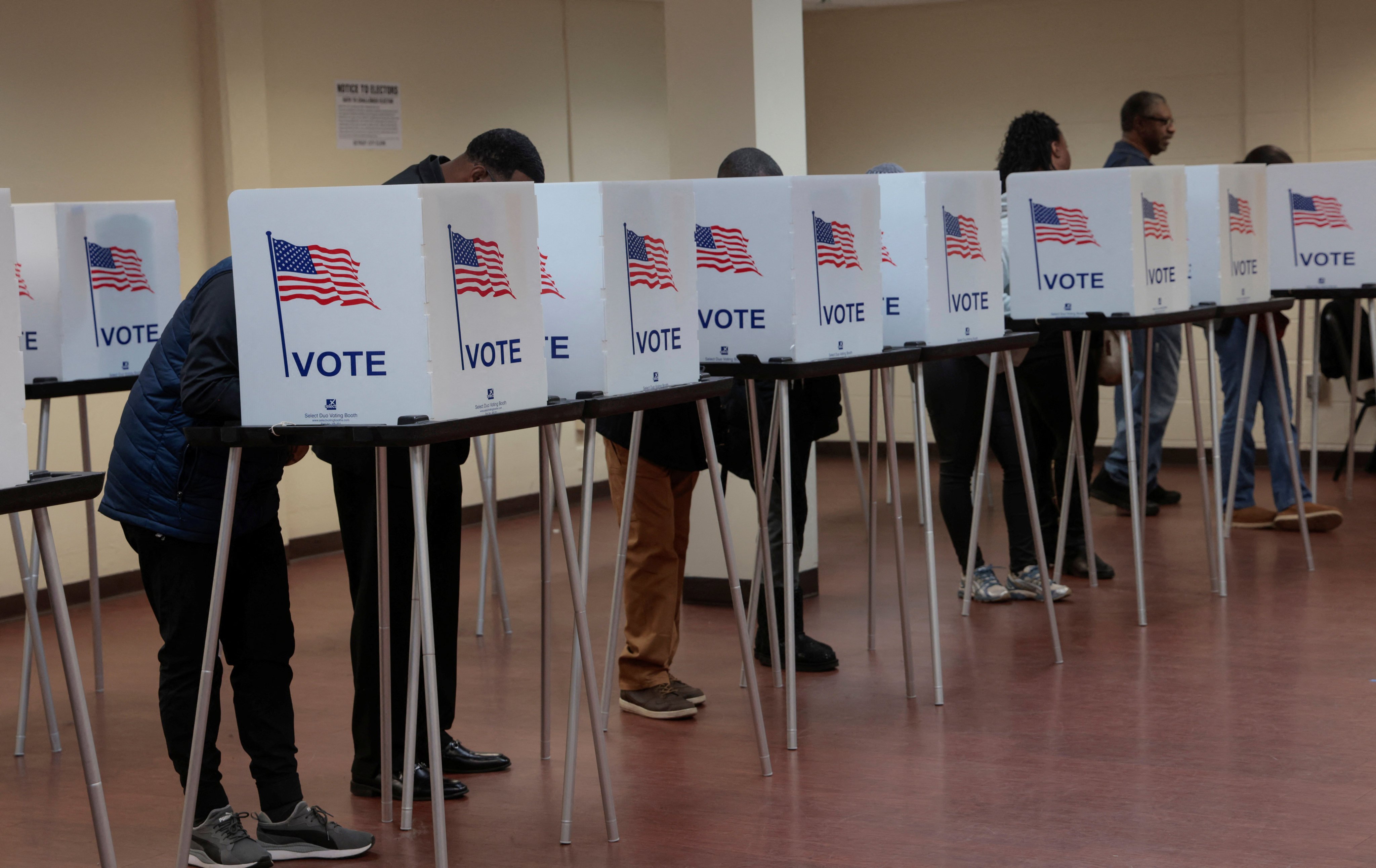 Voters cast their votes during voting in the US presidential election at a polling station in Detroit, Michigan, on November 3, 2024. Photo: Reuters