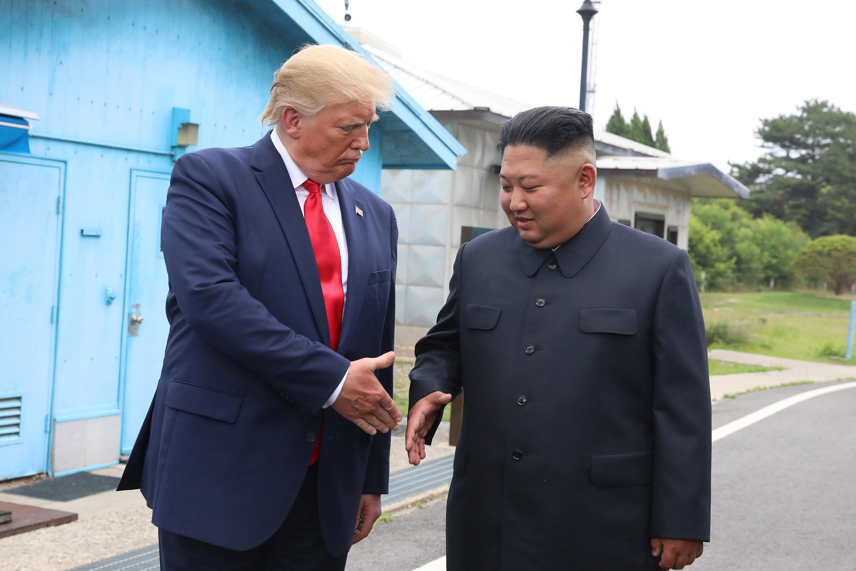 US President Donald Trump (left) and North Korean leader Kim Jong-un meet at the demilitarised zone in June 2019, the third of their three face-to-face meetings during Trump’s first term. Photo: Getty Images/TNS