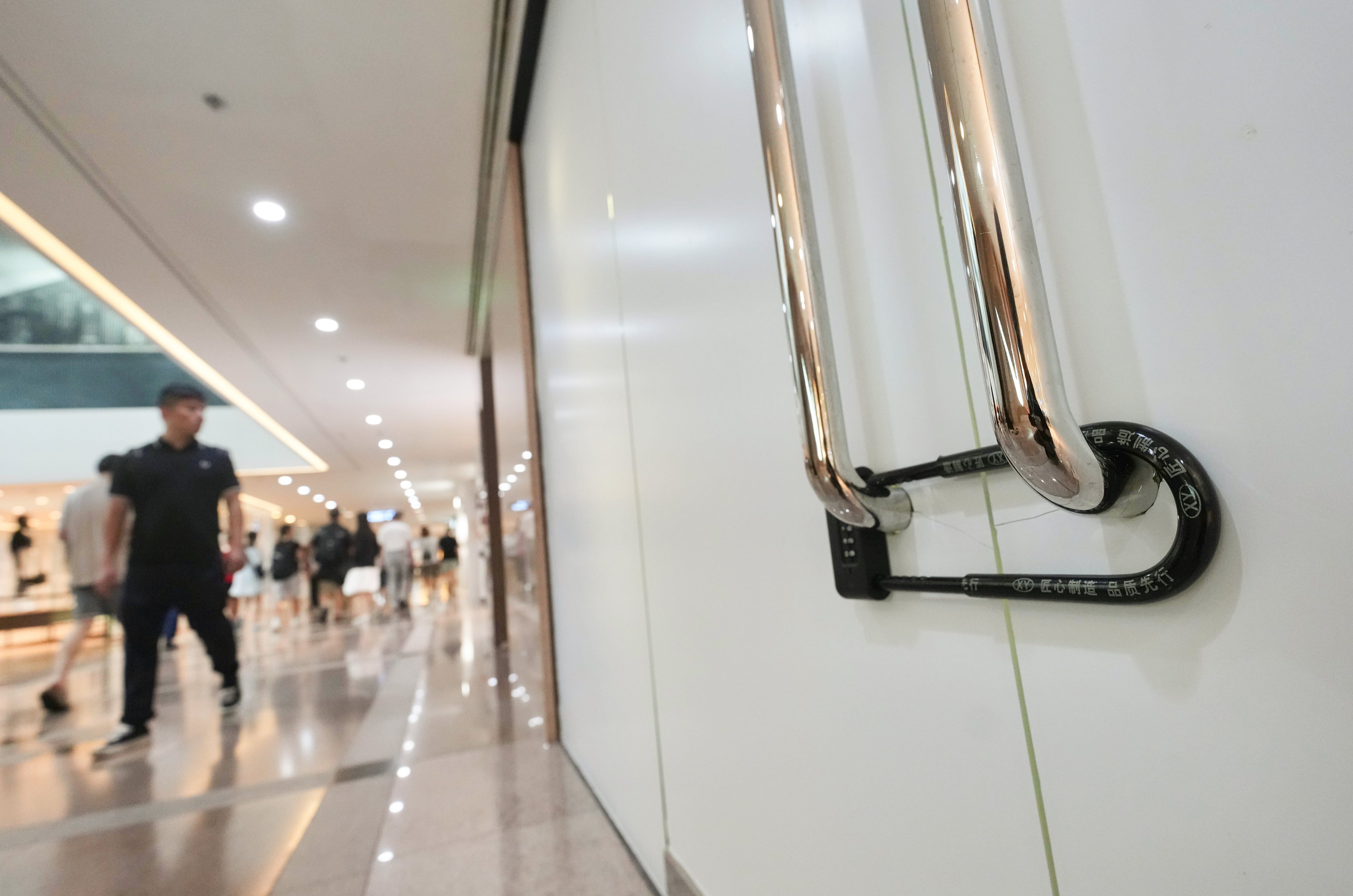 The Lux Boutique outlet at Harbour City in Tsim Sha Tsui is boarded up. Photo: Karma Lo