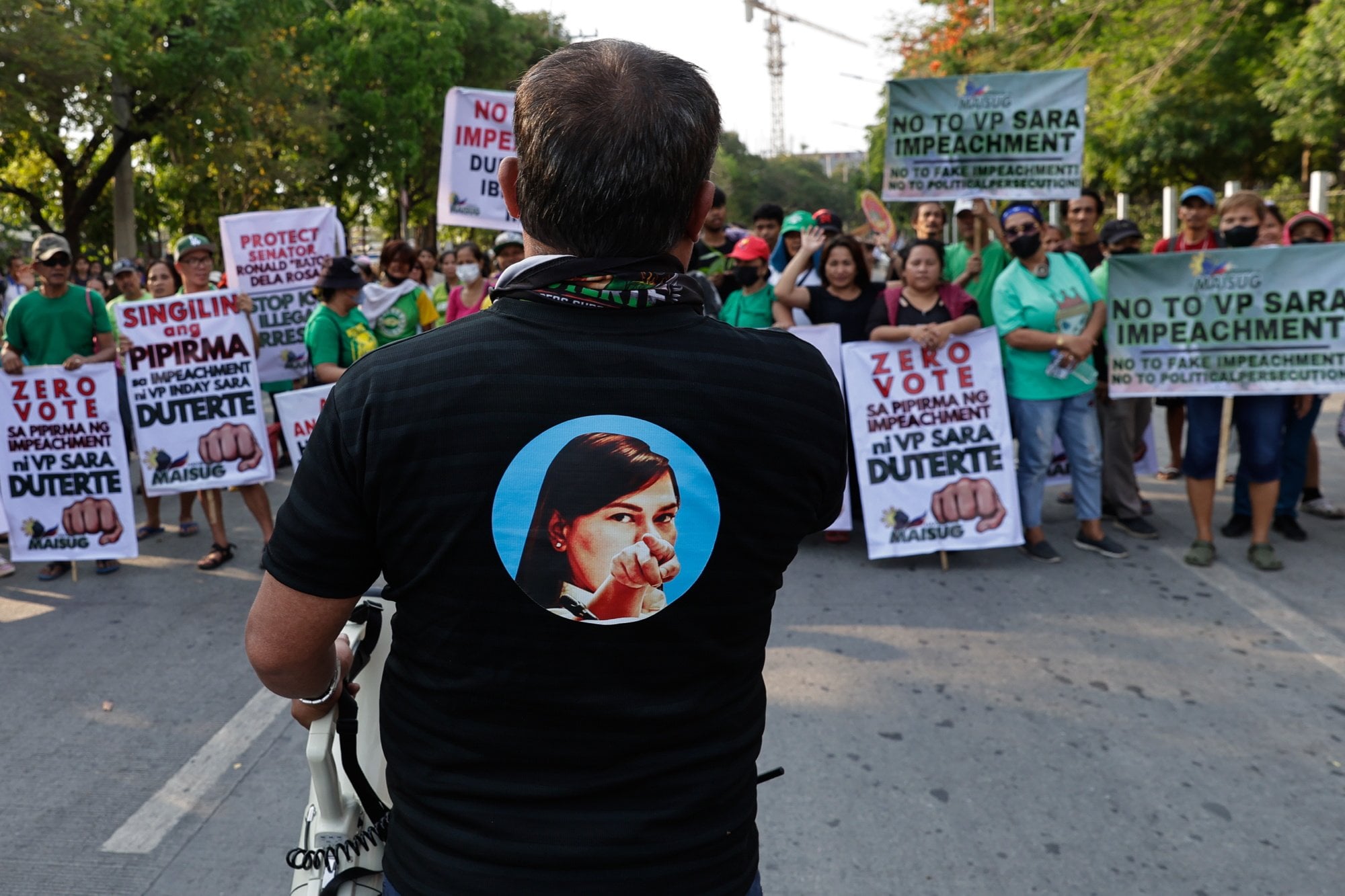 People hold a rally outside the Senate in Pasay City in May, in support of Philippine Vice-President Sara Duterte-Carpio. Photo: EPA