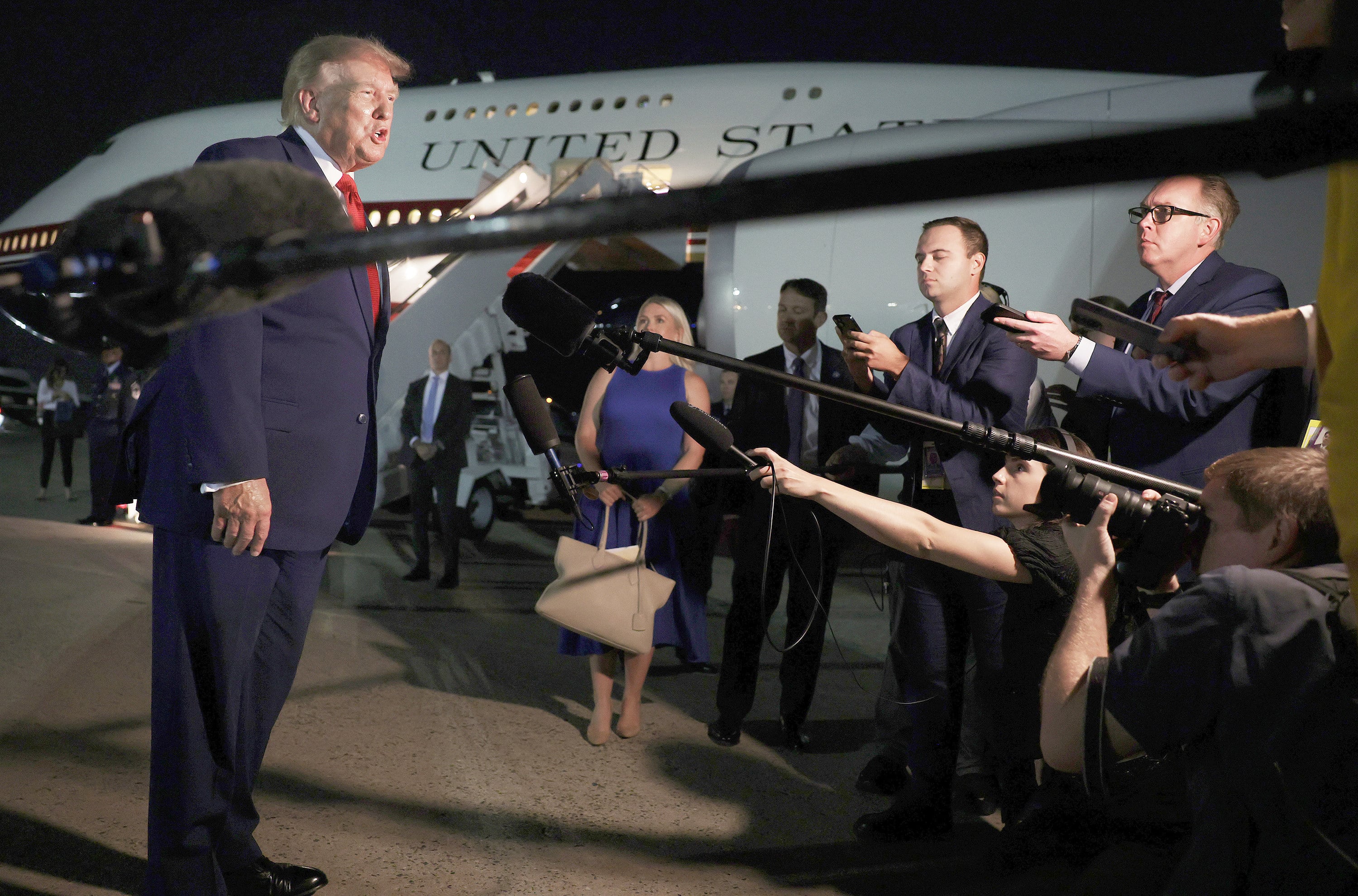 Donald Trump speaks to reporters at Joint Base Andrews in the US state of Maryland on August 11, 2026, about his recent decoy flight from Turkey to the UK after intelligence uncovered a credible Iranian threat to assassinate him. Photo: TNS