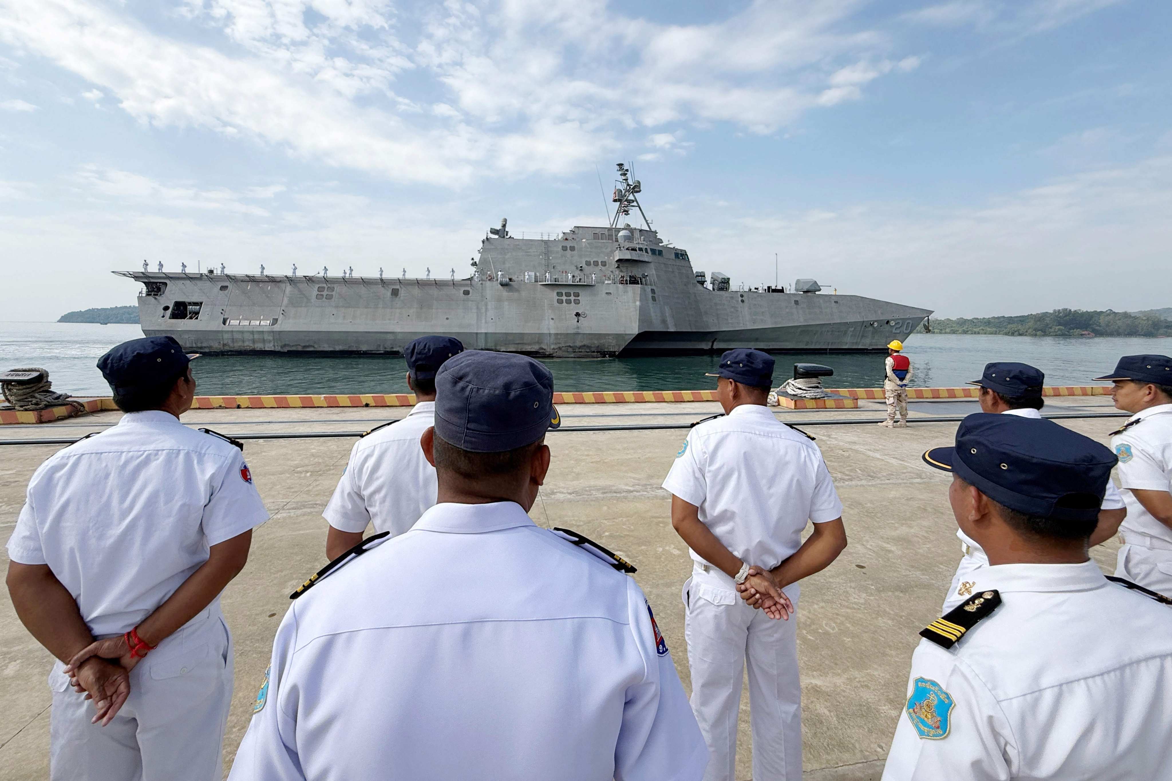 Royal Cambodian Navy personnel stand in formation as they welcome the US Navy’s USS Cincinnati littoral combat ship for a port call at Ream Naval base in January. Photo: AFP