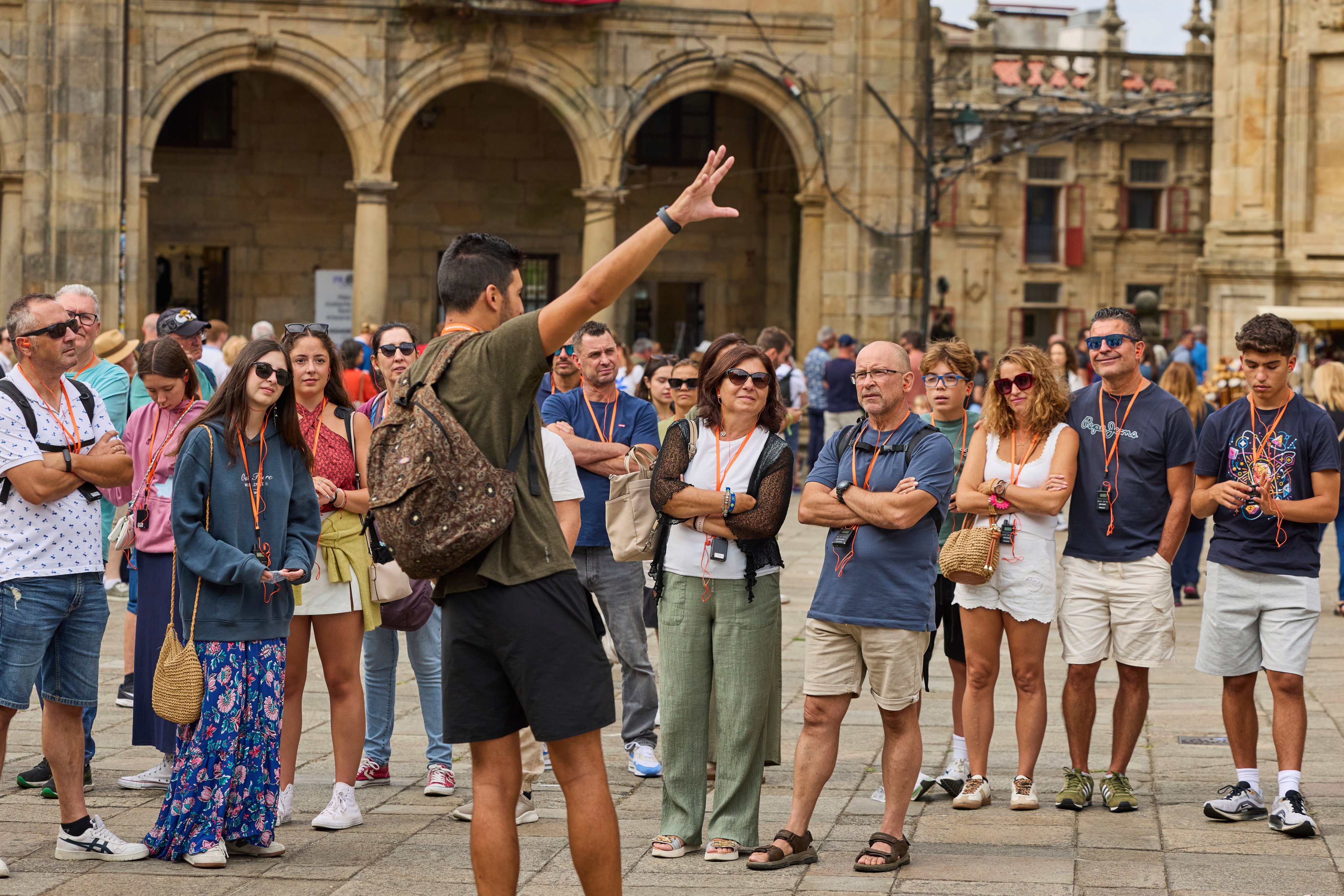 Tourists listen to a tour guide outside the cathedral in Santiago de Compostela, northwestern Spain. Photo: AP
