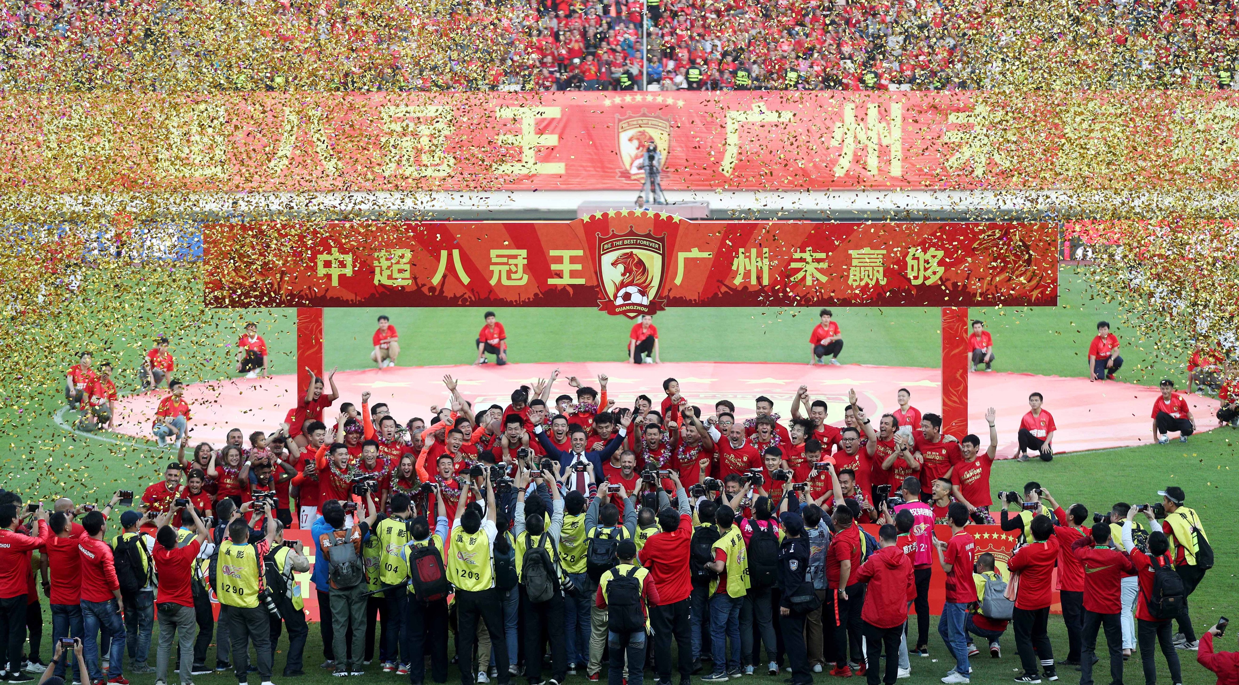 Guangzhou Evergrande celebrate after winning their record eighth Chinese Super League title in 2019. Photo: Xinhua