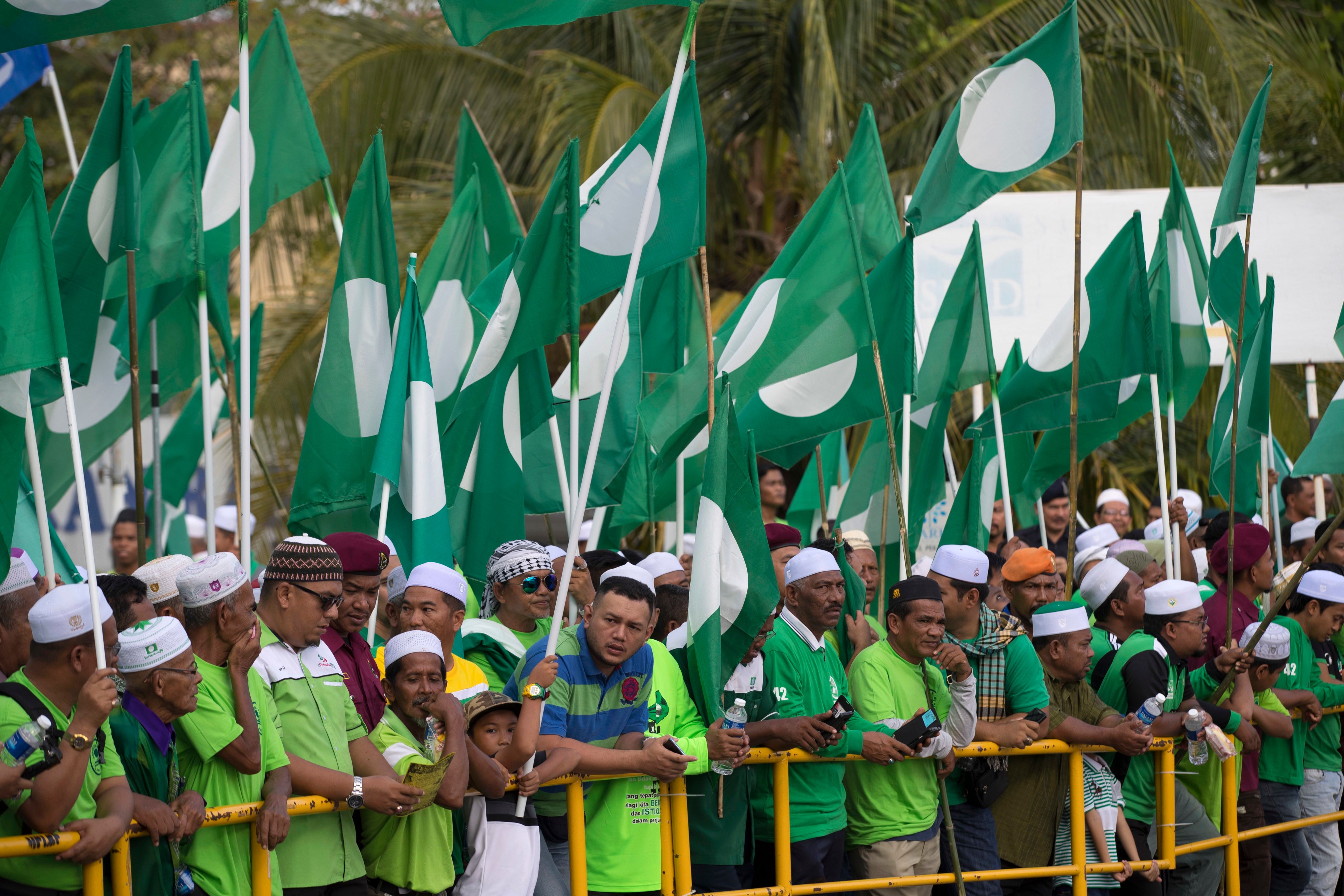 PAS supporters gather outside an election nomination centre in Langkawi, Malaysia, in 2018. Photo: AP