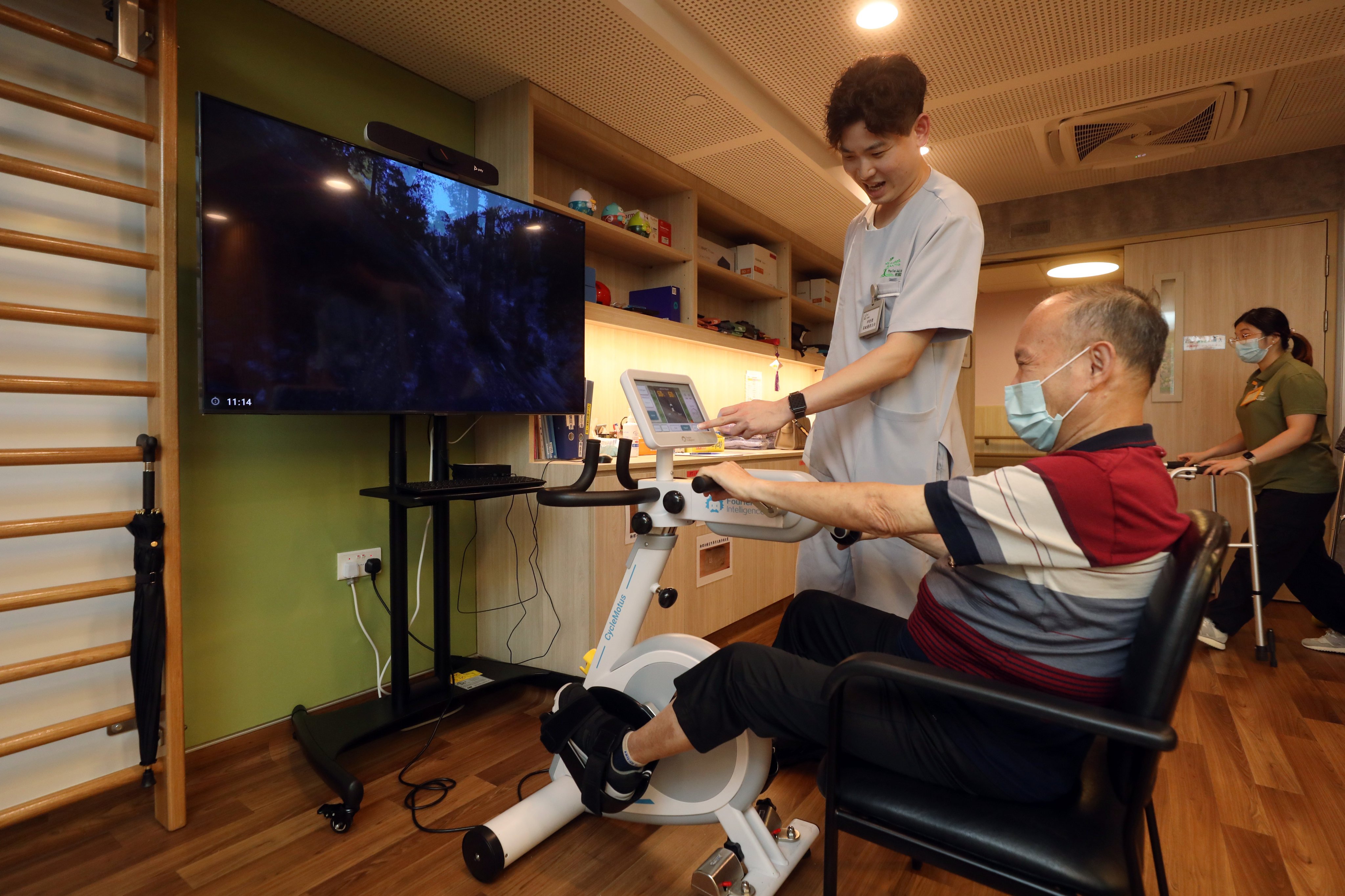 An elderly resident undergoes physiotherapy at Pine Care Jade Maison, a care facility in Sheung Shui. Photo: Sun Yeung