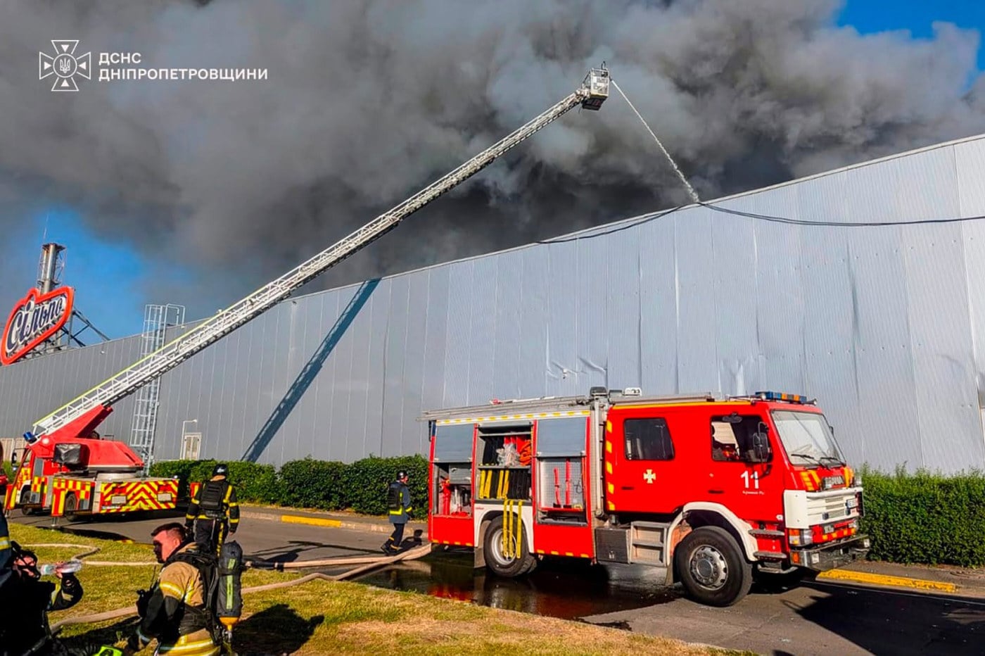 Firefighters work on a fire at a shopping centre following a Russian drone attack in Kryvyi Rih, Ukraine, on Friday. Photo: Ukrainian Emergency Service/AP