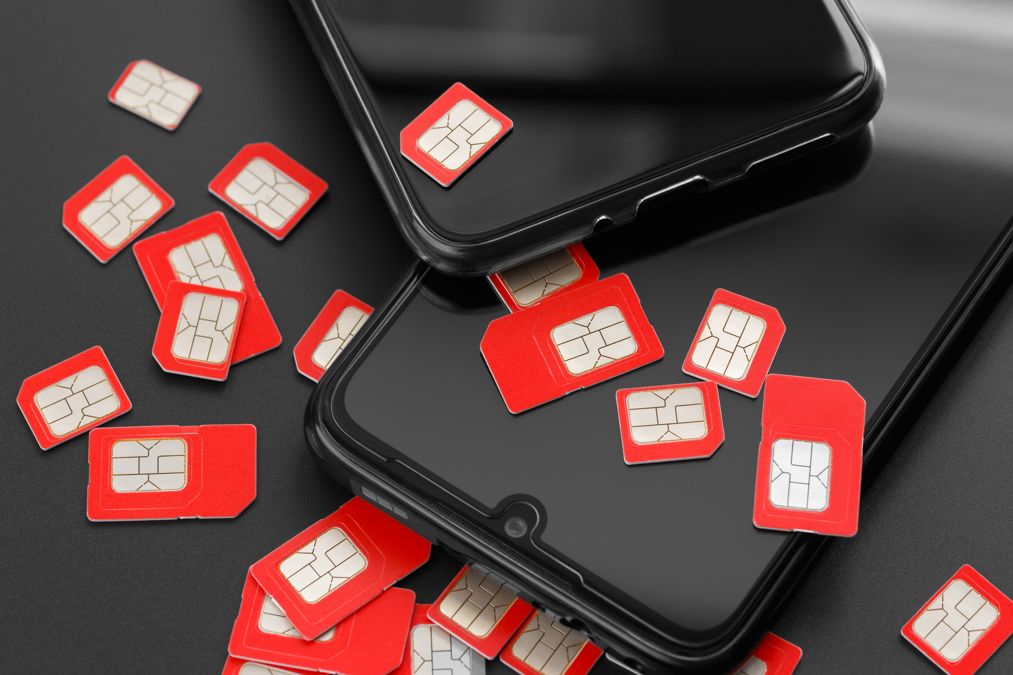 Officers seized 110 SIM cards, nine mobile phones and a modem pool from a hotel room, allegedly used to send more than 2,000 scam messages. Photo: Getty Images