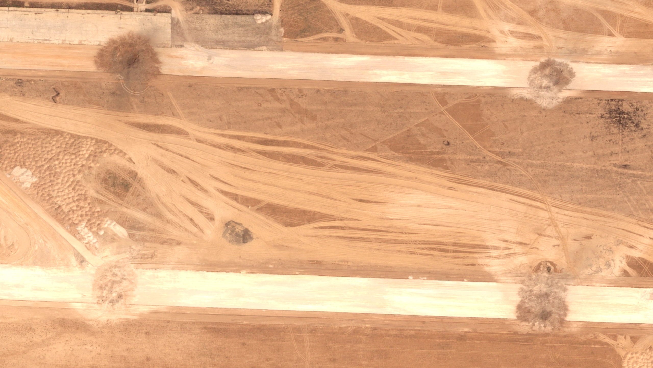 A satellite image shows craters on the runways of Abu Al-Duhur airbase near Syria’s Aleppo after an Israeli attack on Tuesday. Photo: Pleiades Neo © Airbus DS 2026/Reuters
