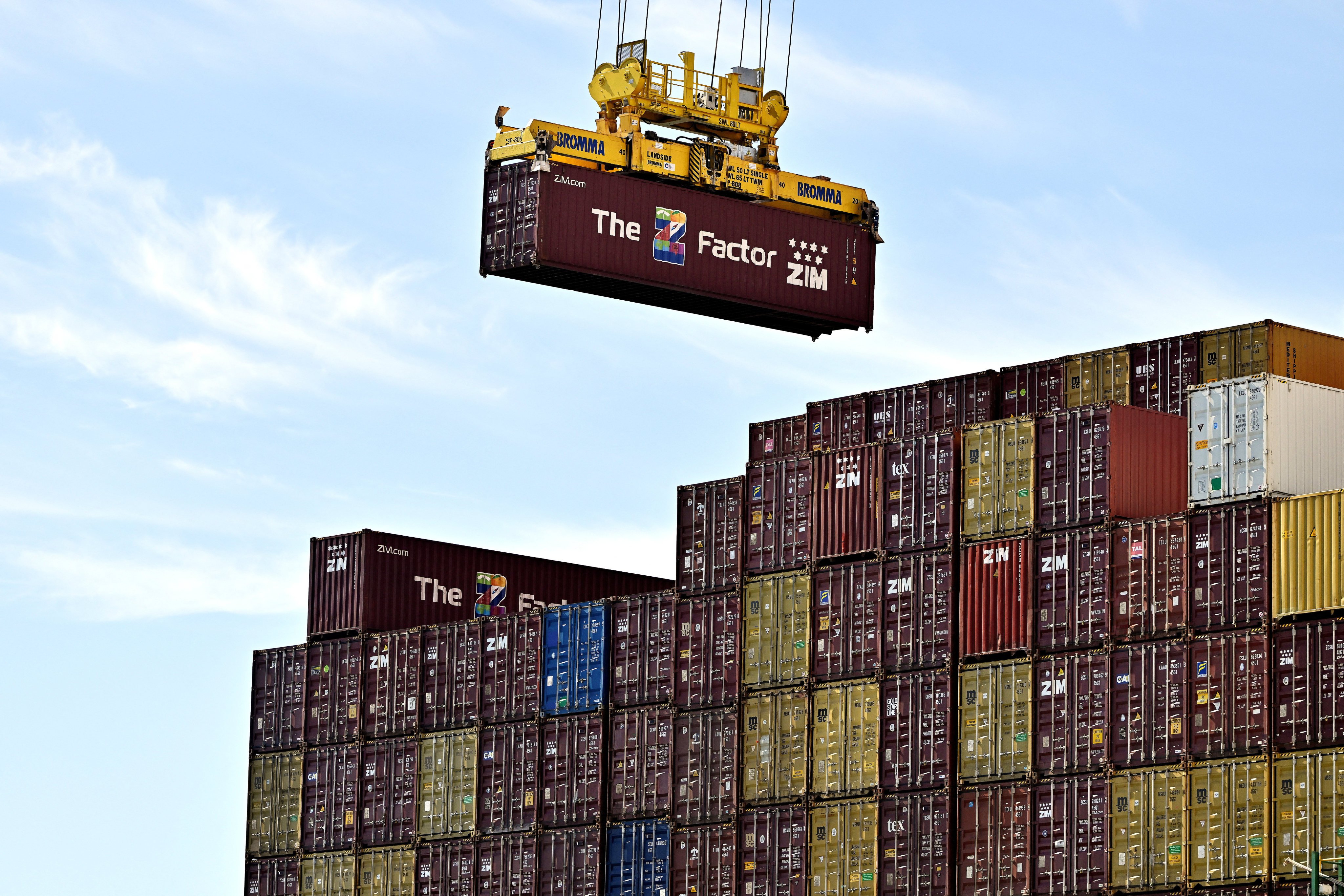 A crane operates at a container terminal in Alberta, Canada. Import taxes will hit about 5 per cent of what Canada ships to the United States every year. Photo: Reuters