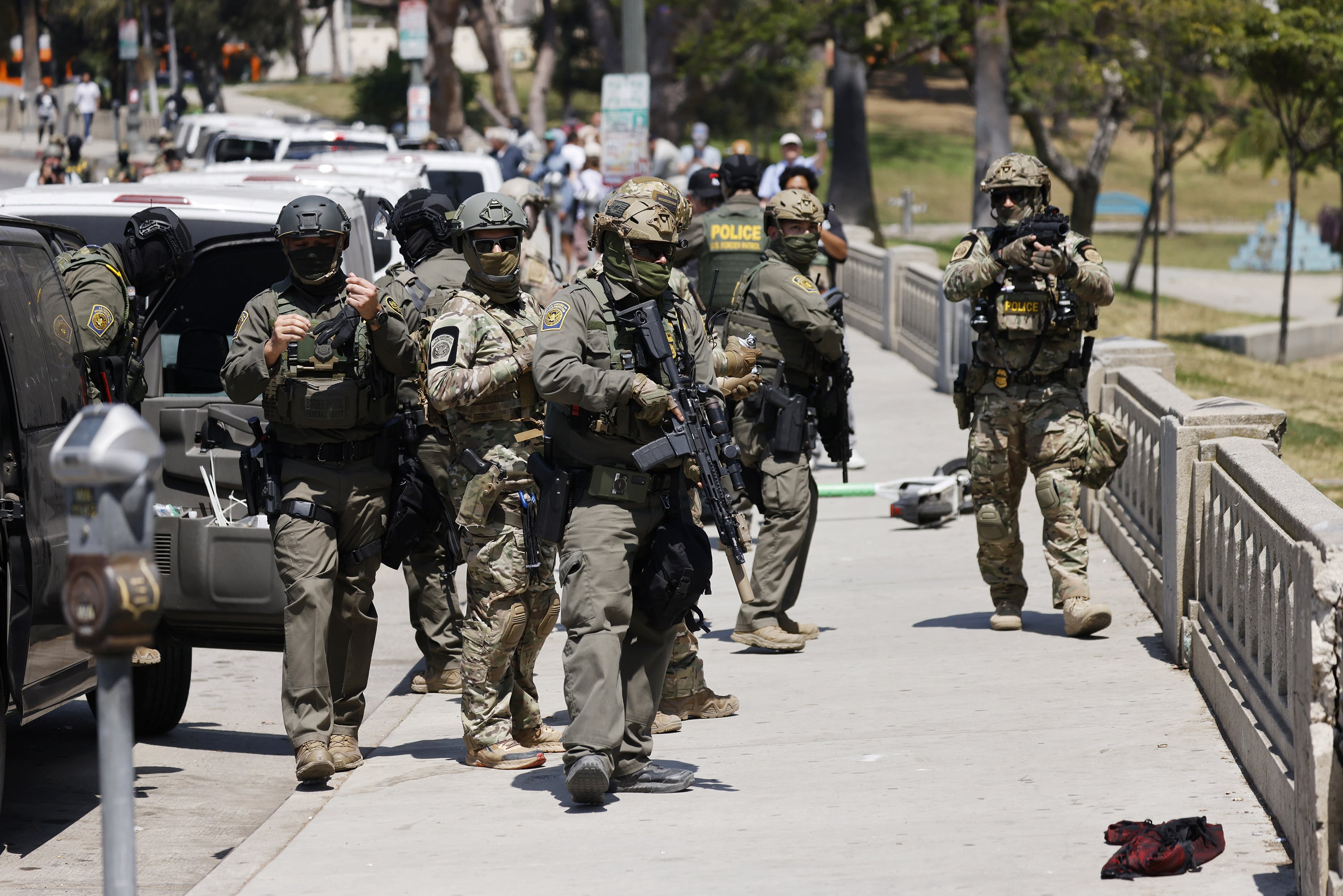 Federal immigration agents seen in Los Angeles last year. US President Donald Trump has pursued an ‌aggressive immigration crackdown during his second term. Photo: Los Angeles Times/TNS