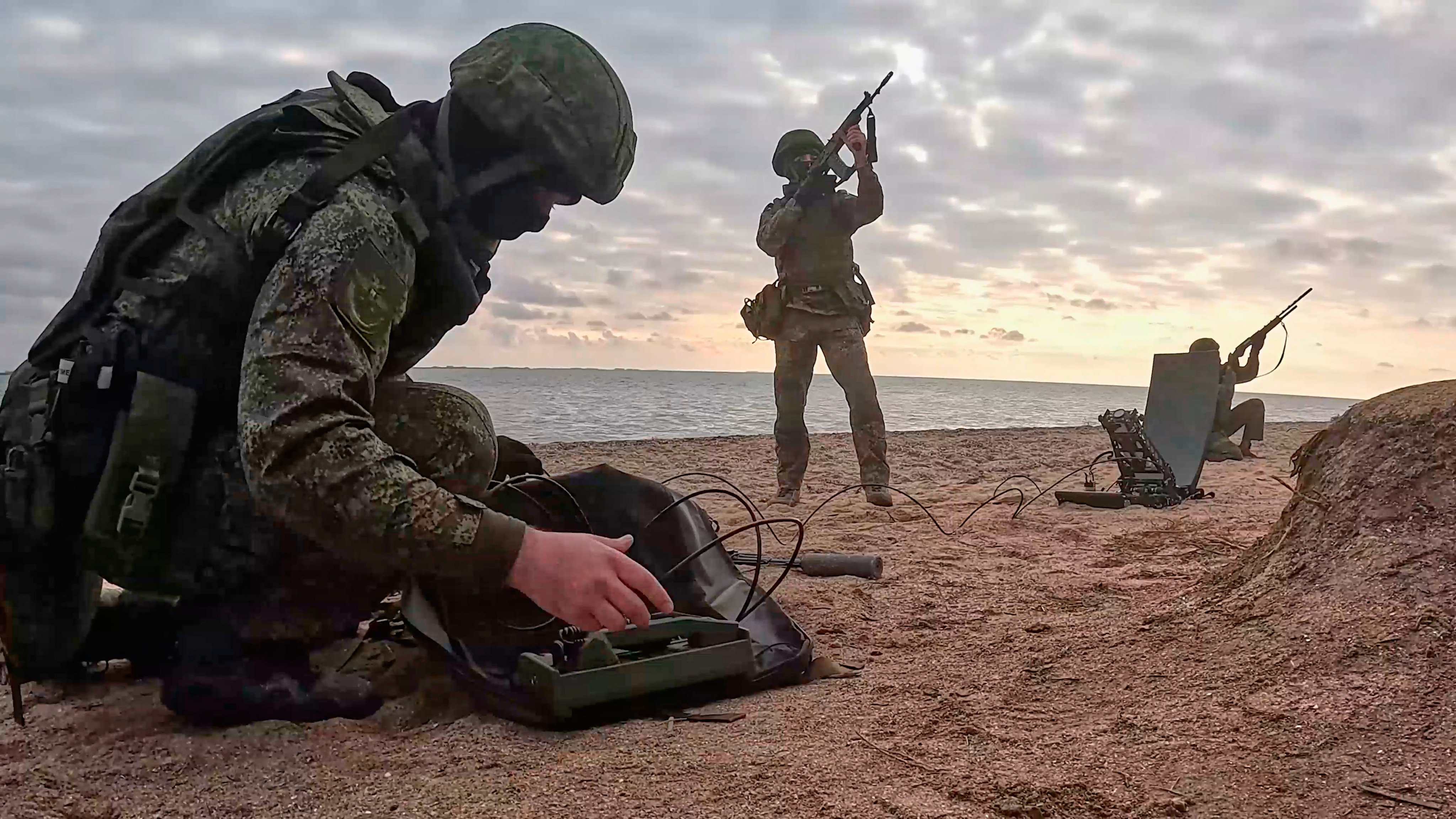 Russian soldiers set up communications in an undisclosed location in Ukraine. Photo: AP