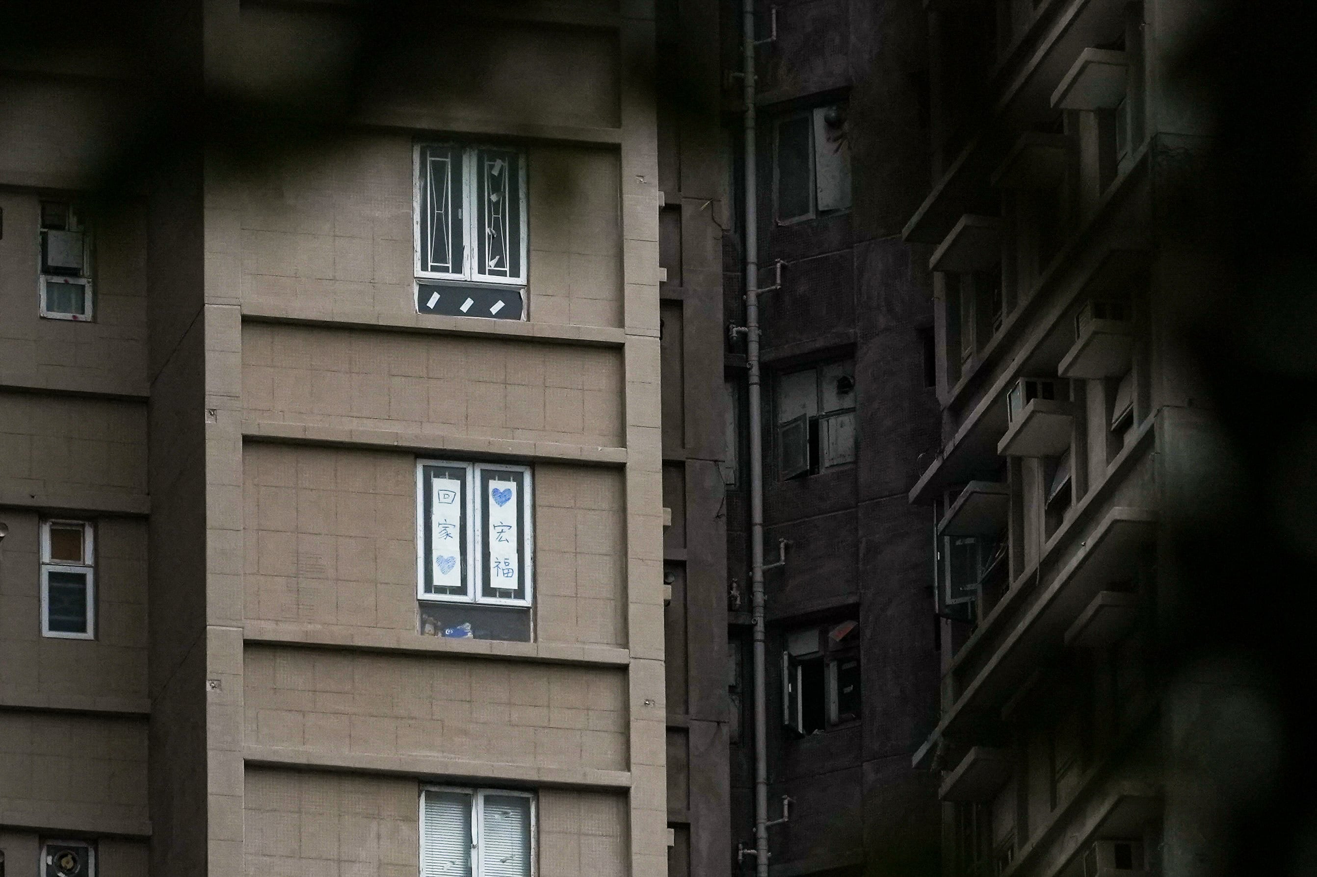 A message expressing affection for Wang Fuk Court is seen in a window at the estate. Photo: Sun Yeung