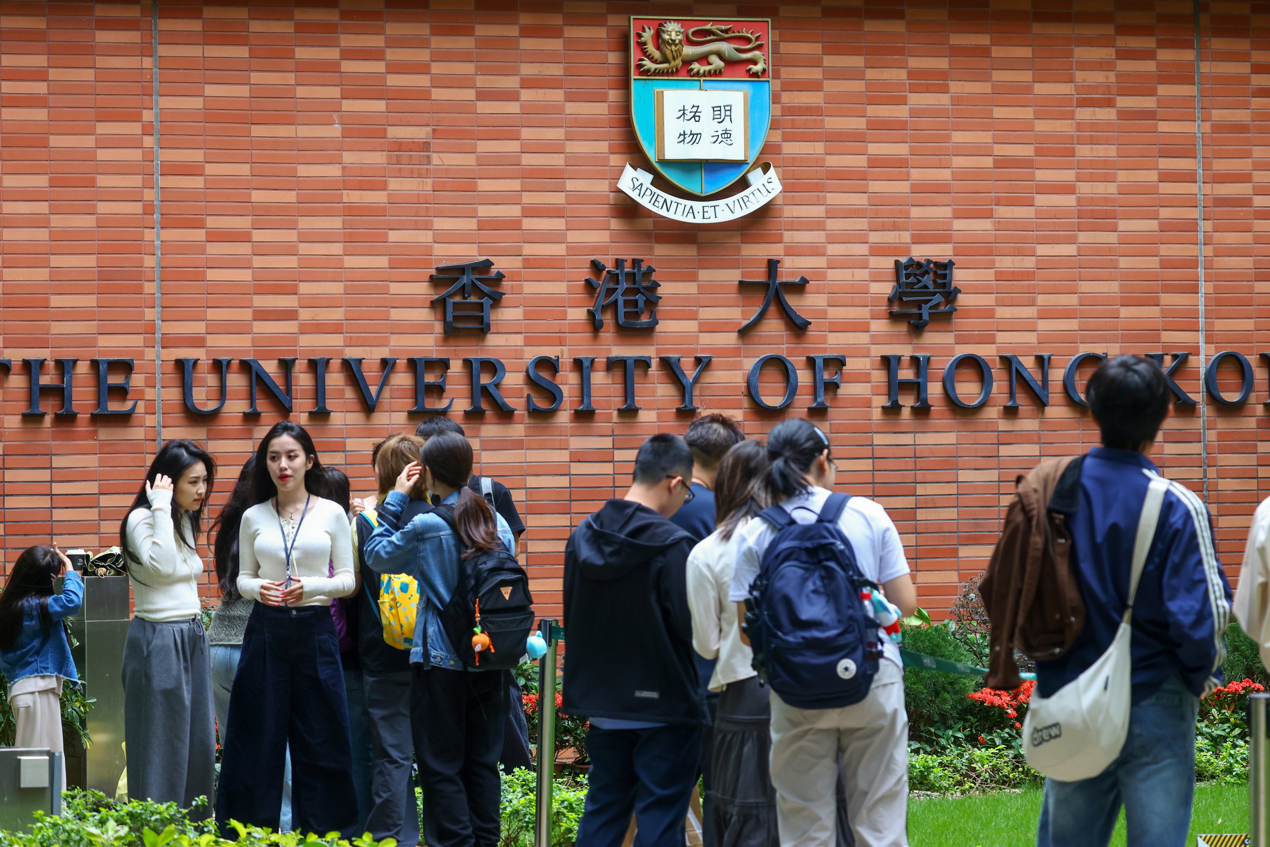 Students at the University of Hong Kong. The number of DSE students admitted to government-funded Year One university places has dropped by 7 per cent. Photo: Dickson Lee