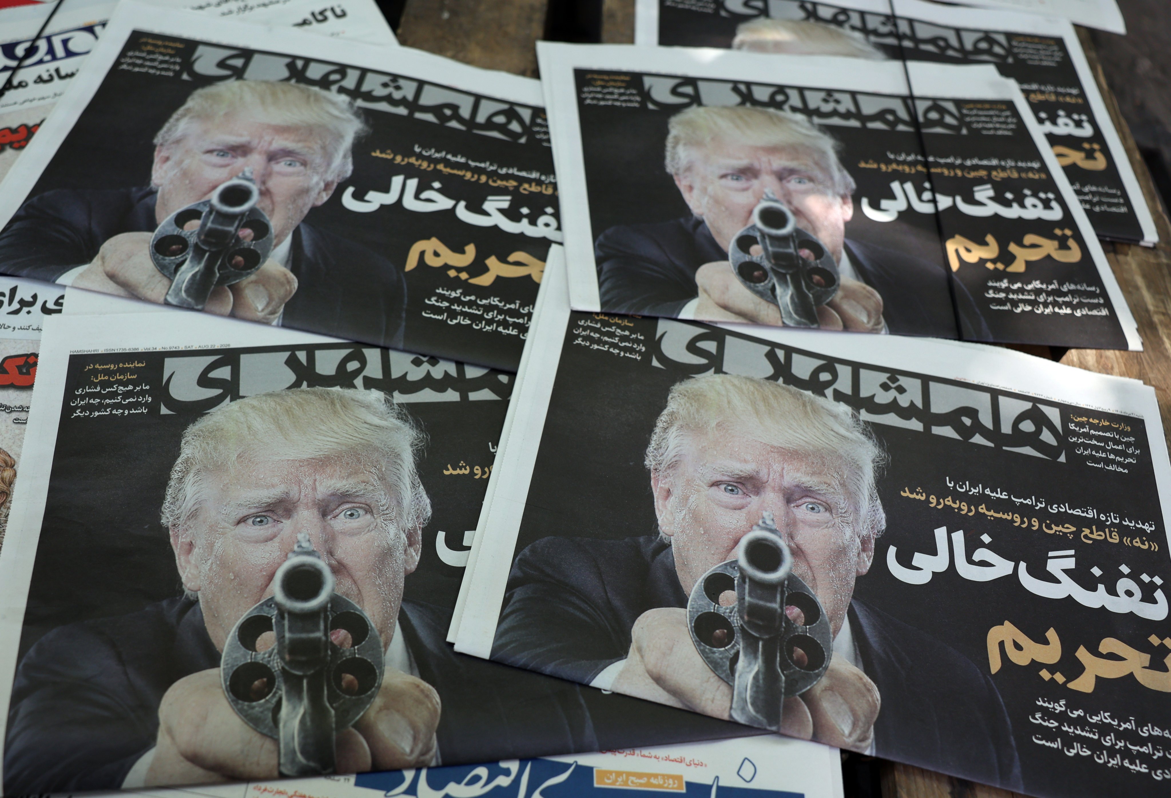 Copies of an Iranian newspaper displaying a picture of US President Donald Trump outside a kiosk in Tehran on Saturday. Photo: EPA