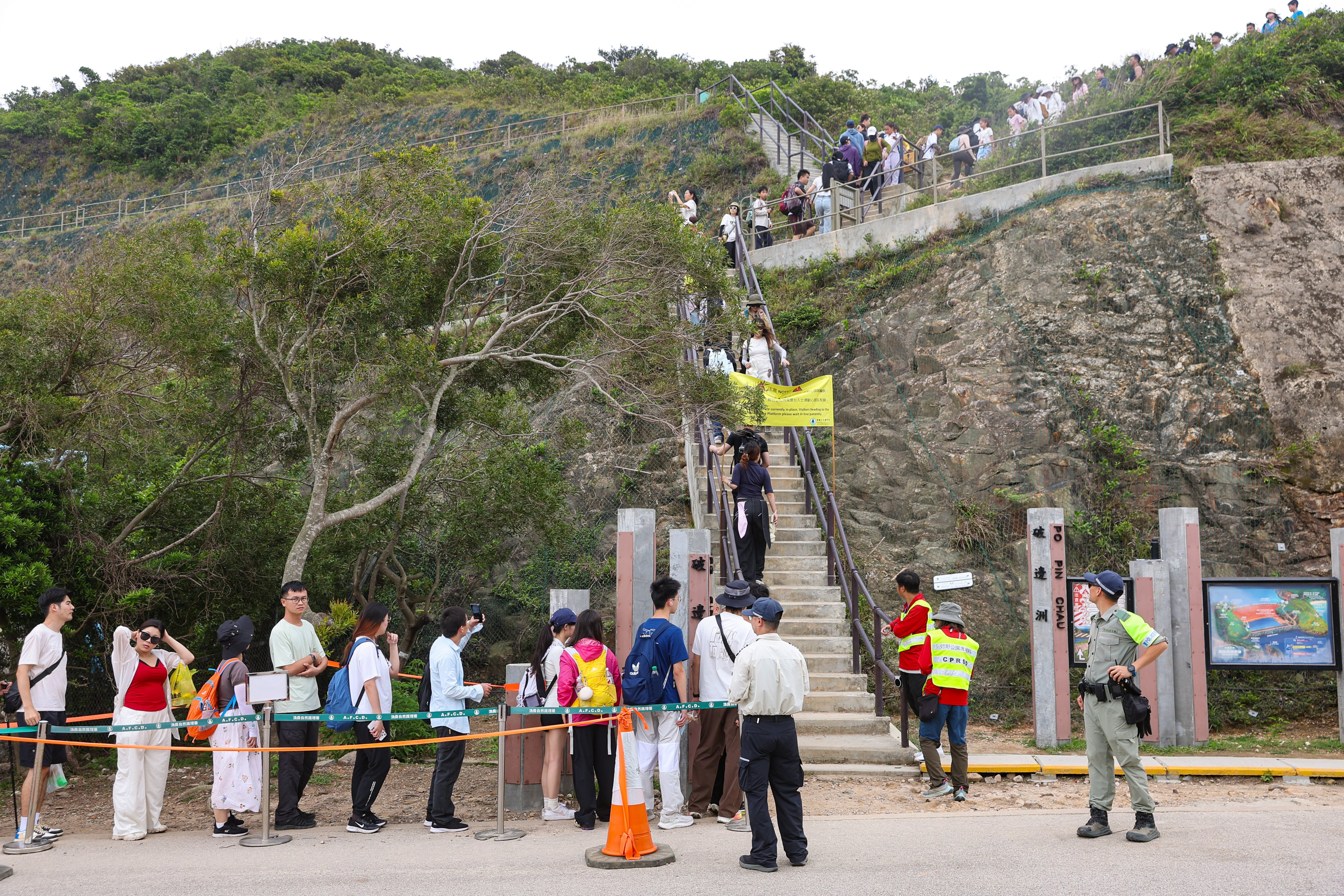 Tourists queue to visit the Po Pin Chau section of the High Island Geo Trail. Photo: Edmond So