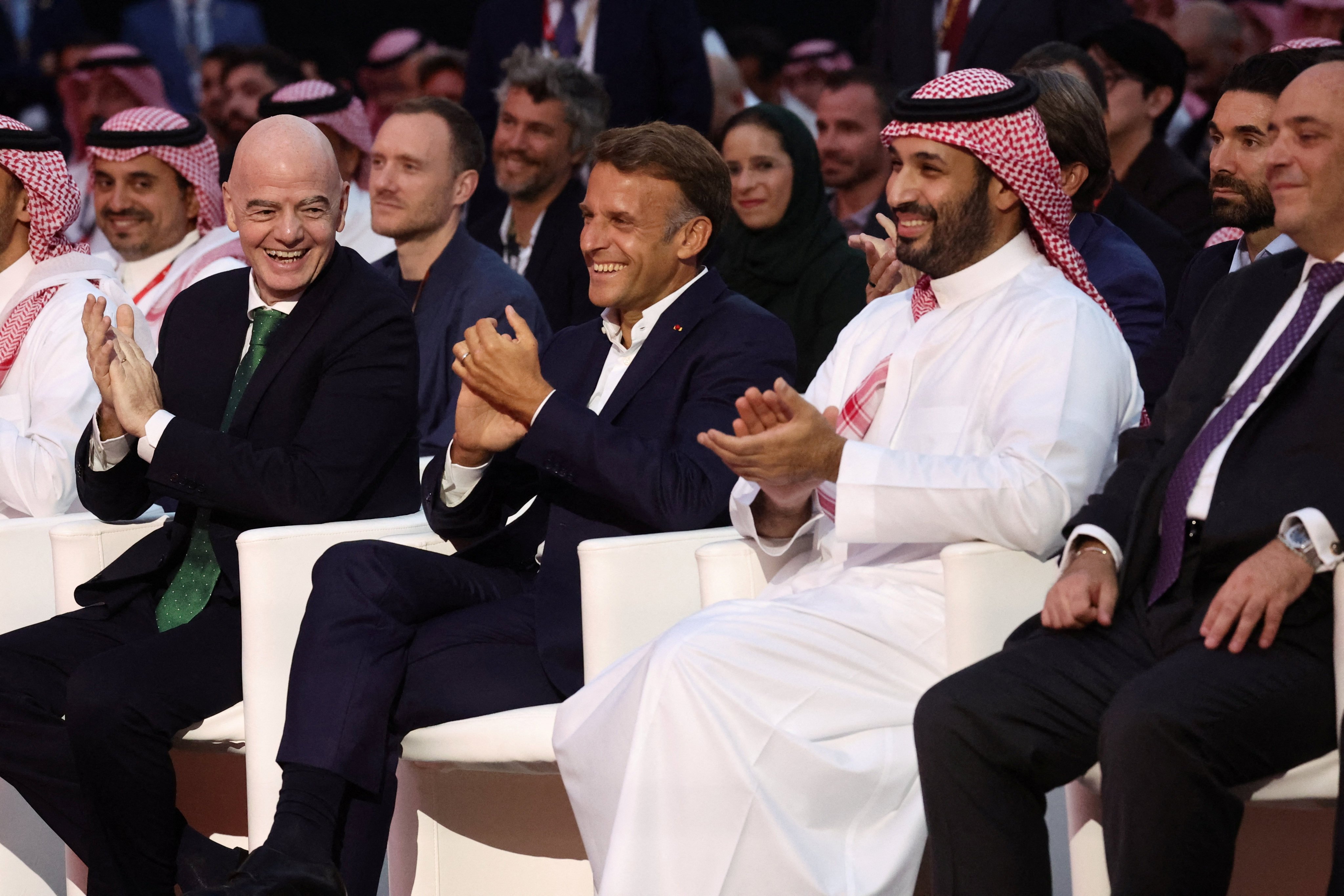 French President Emmanuel Macron (centre), Fifa President Gianni Infantino (left) and Saudi Crown Prince Mohammed bin Salman attend the closing ceremony of the Esports World Cup at the Grand Palais in Paris, France on Sunday. Photo: Pool via Reuters