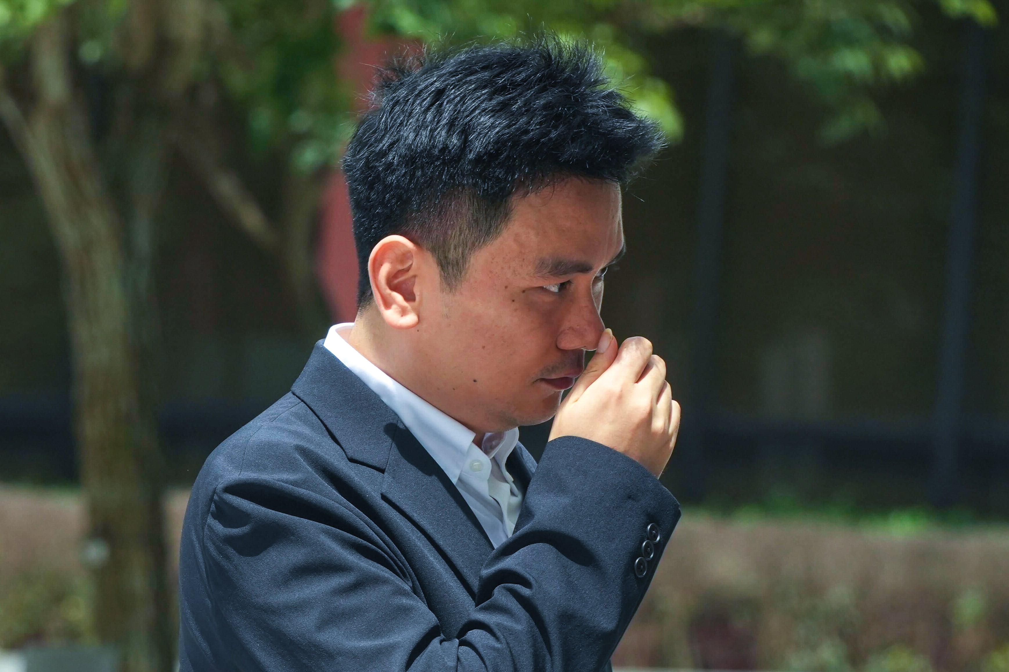 CUHK associate professor Peng Peng arrives at Sha Tin Court ahead of the verdict. Photo: Sun Yeung
