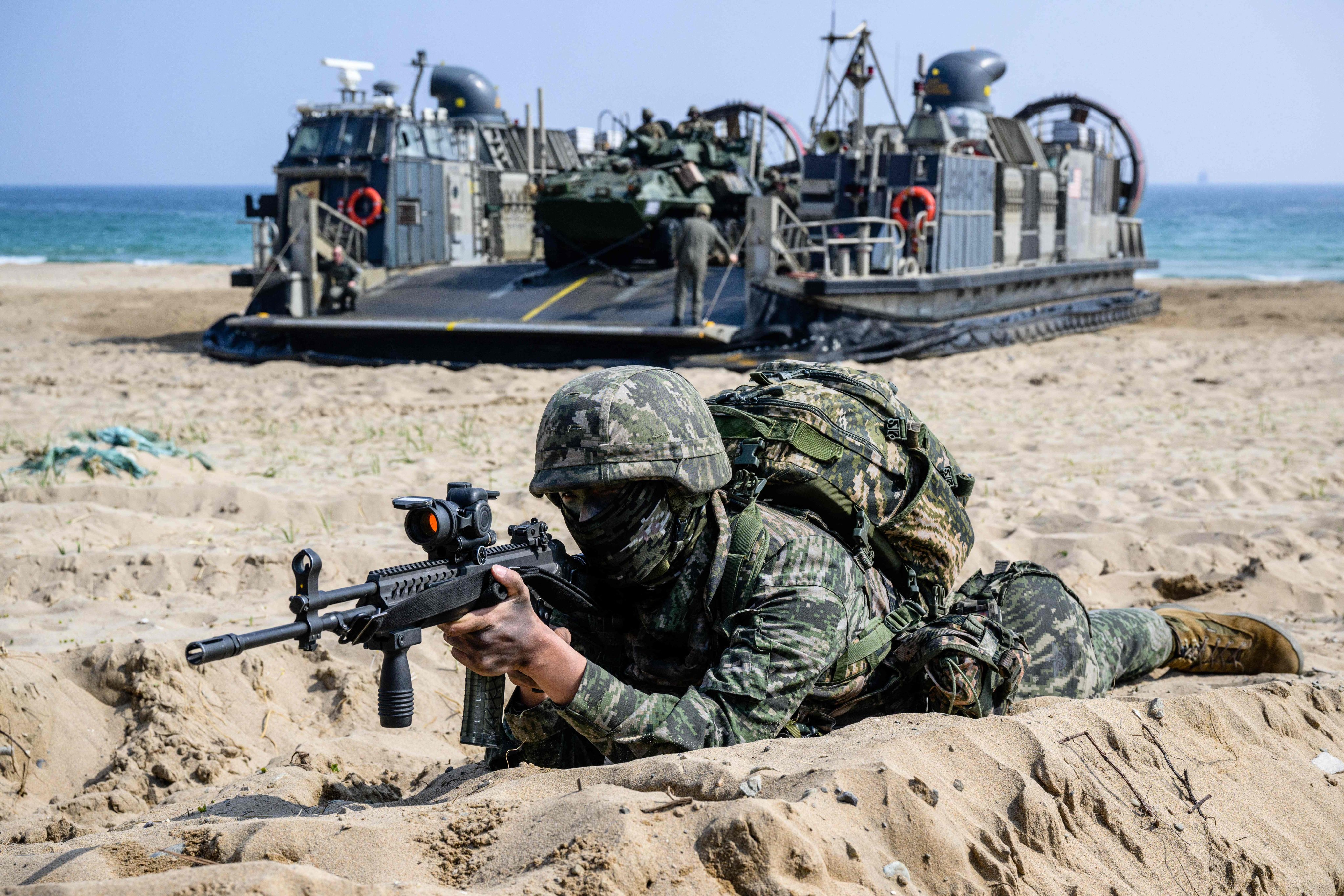 A South Korean marine takes position during the “Ssangyong 2023 Exercise” joint landing operation by US and South Korean Marines in the southeastern port of Pohang in March 2023. Photo: AFP