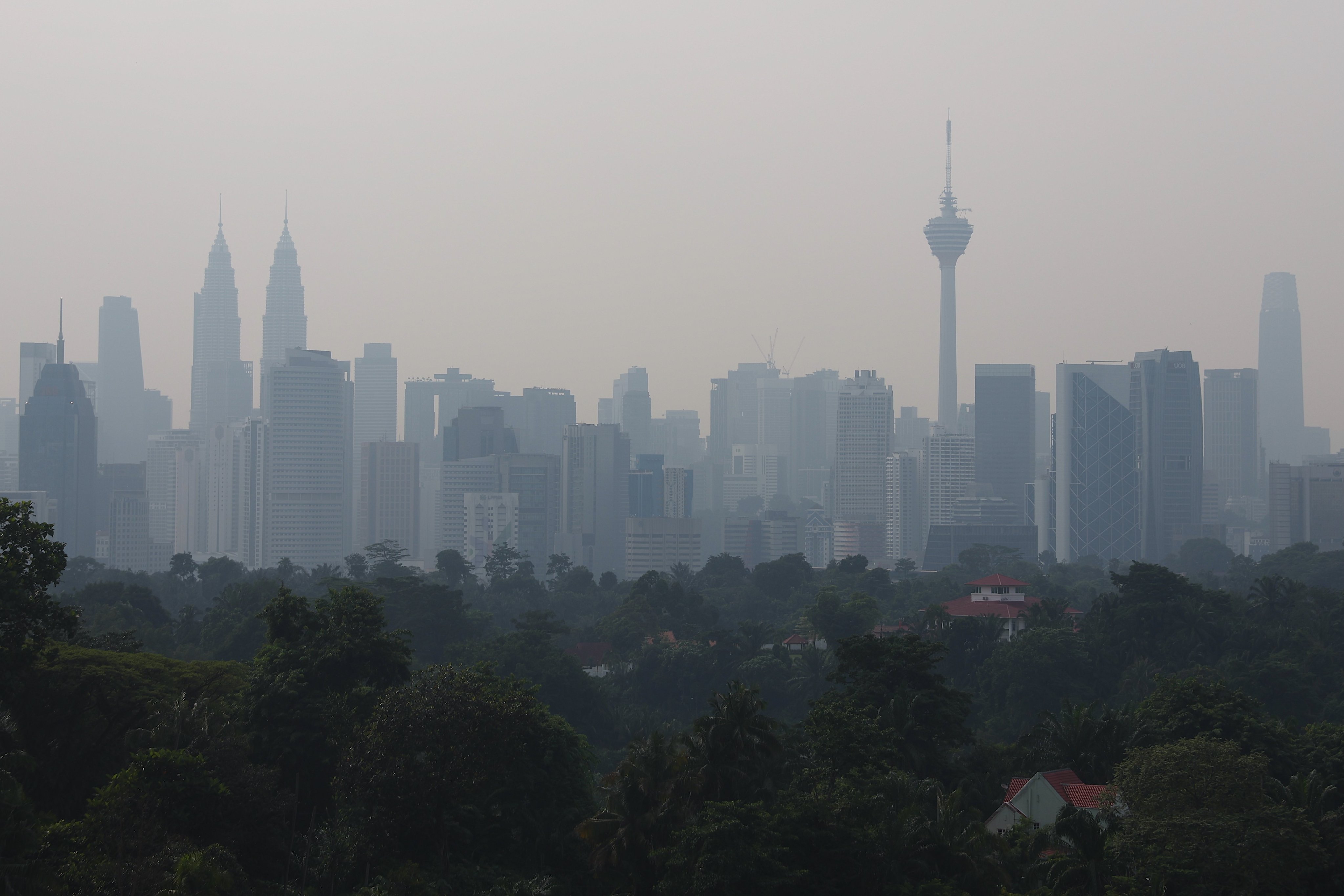 The city skyline blanketed in haze, in Kuala Lumpur, Malaysia, on August 13. Photo: EPA
