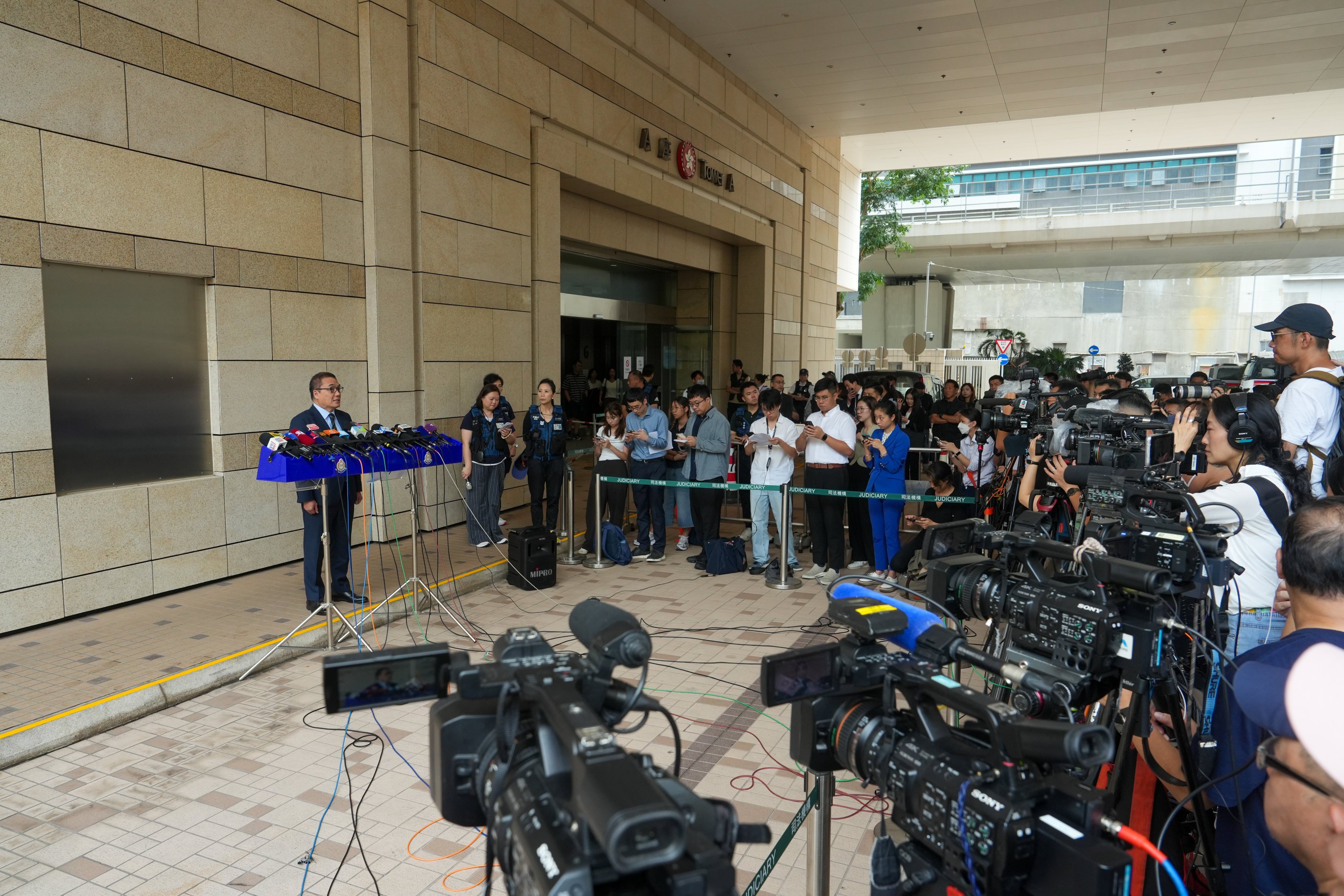 Chief Superintendent Steve Li of the force's national security department addresses the media at West Kowloon Court after the verdict on August 21. Photo: Sun Yeung