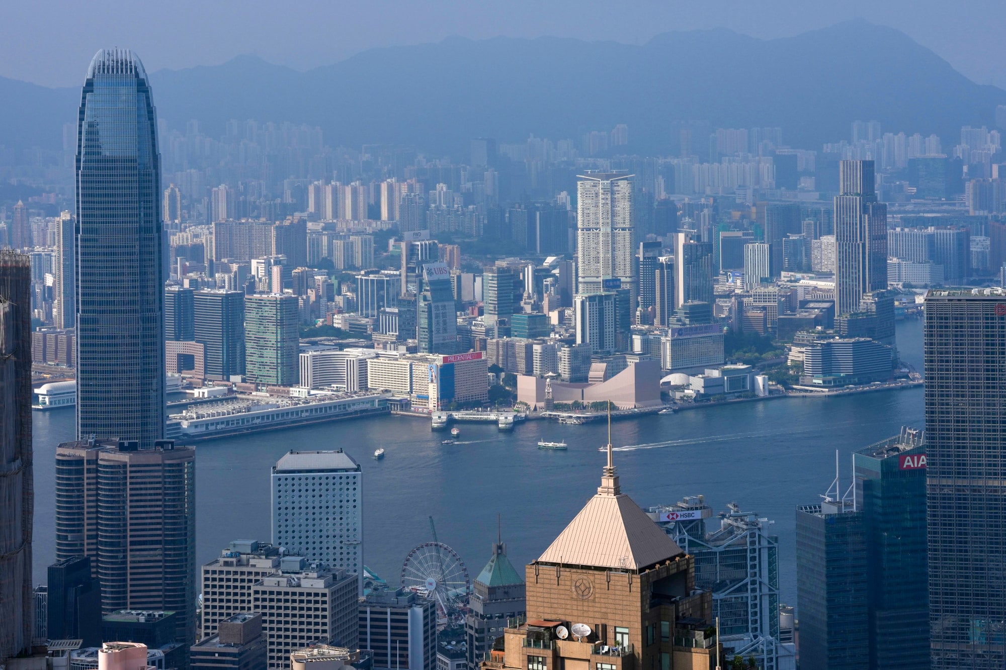 Victoria Harbour and Hong Kong’s skyline are seen from the peak. Hong Kong’s home prices rose an average of 7.9 per cent in the first half. Photo: Karma Lo