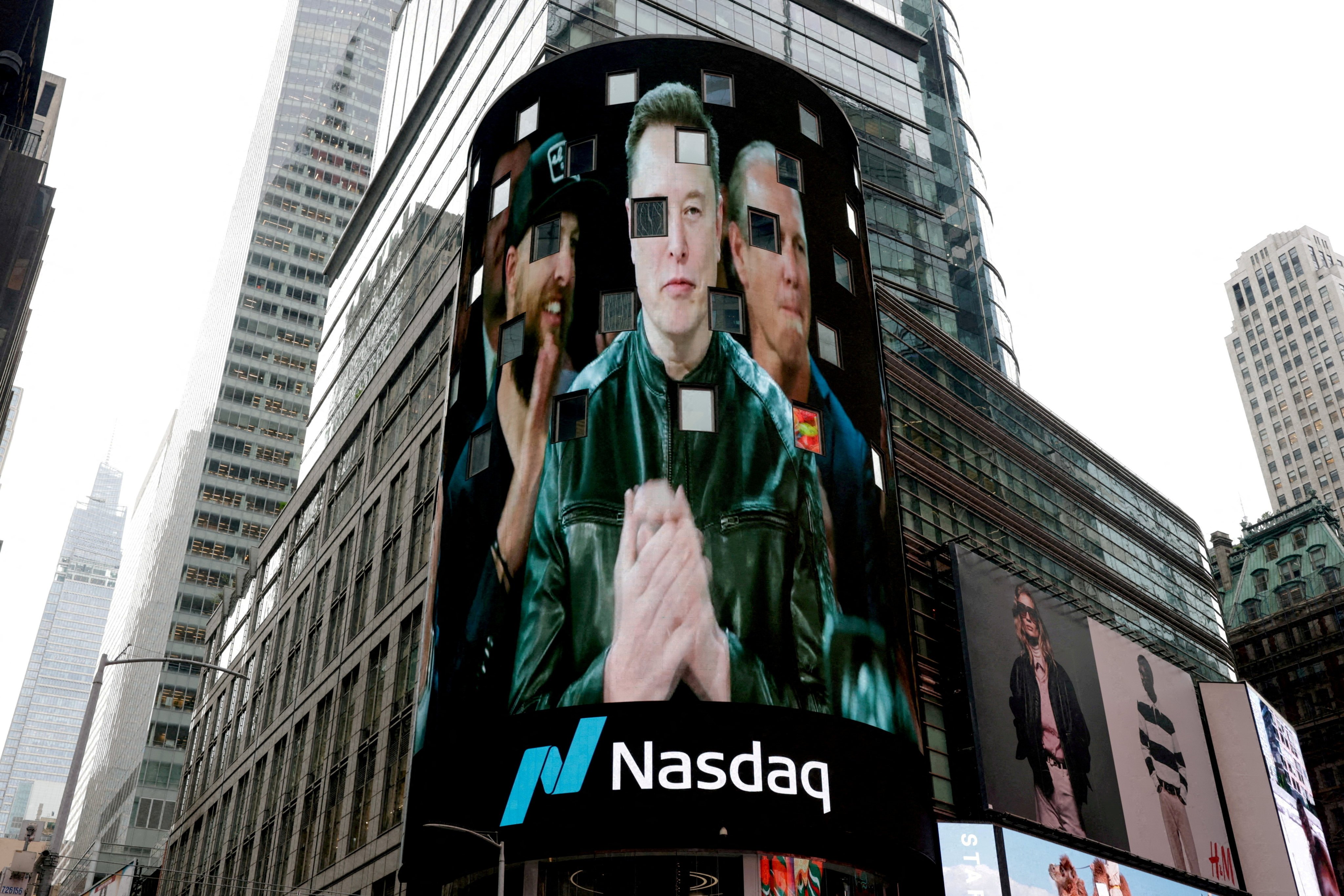 A live feed shows SpaceX CEO Elon Musk on the day of SpaceX’s initial public offering (IPO) at the Nasdaq MarketSite in New York on June 12. Photo: Reuters