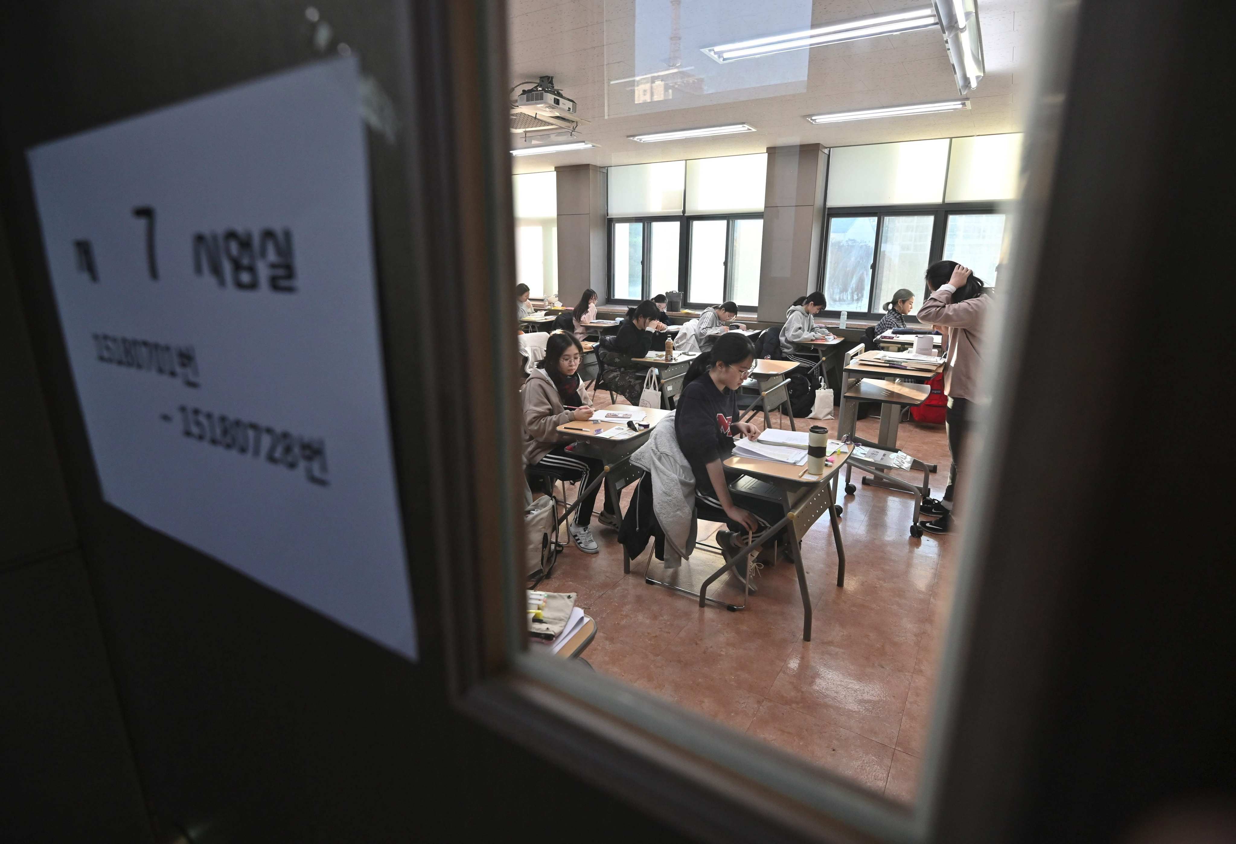 Students prepare to sit the annual college entrance exam in a classroom at a high school in Seoul. Photo: AFP