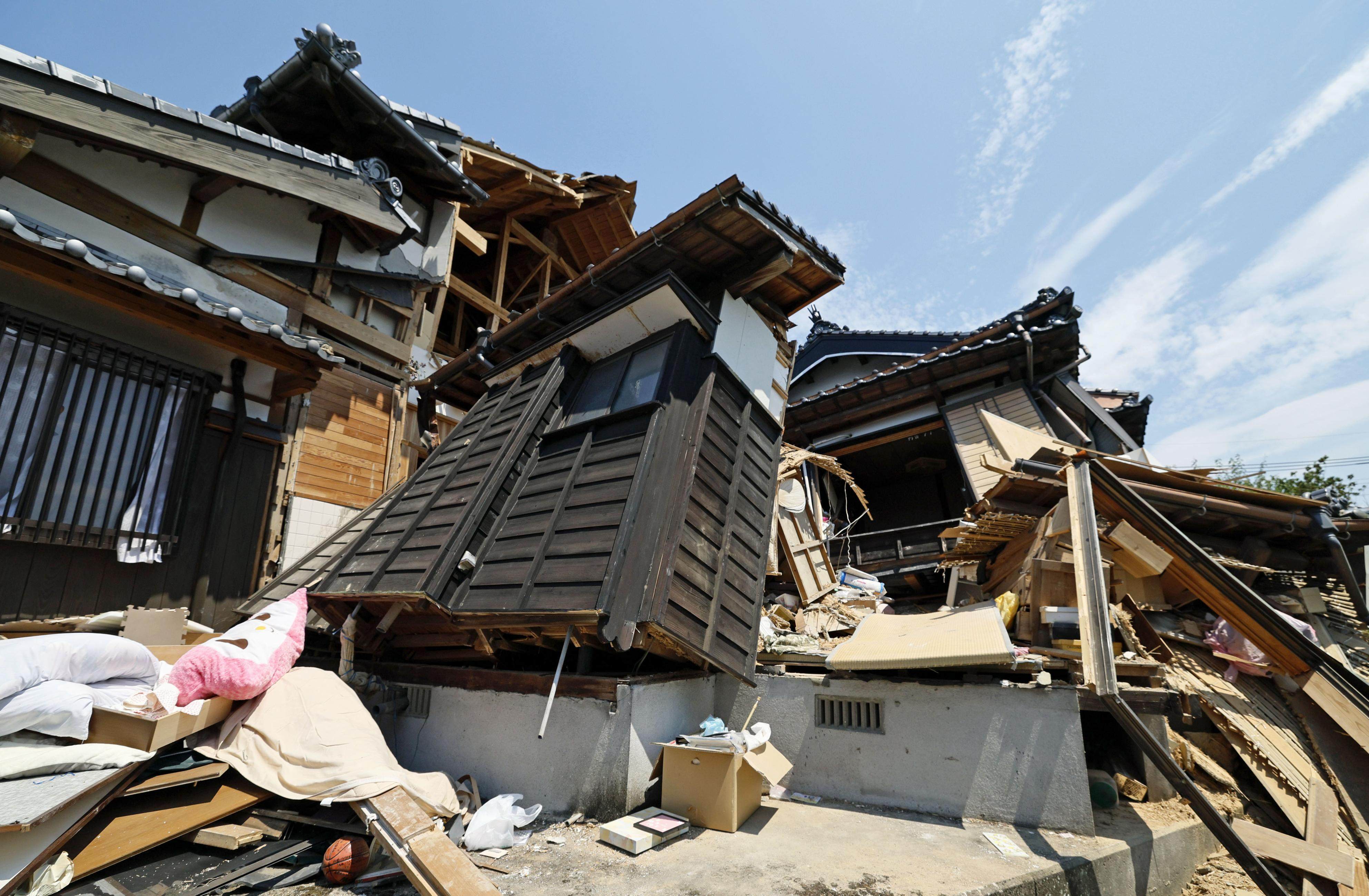 Houses damaged by the July 28 magnitude 7.1 earthquake in Hikawa, Kumamoto prefecture on August 2. Photo: Kyodo