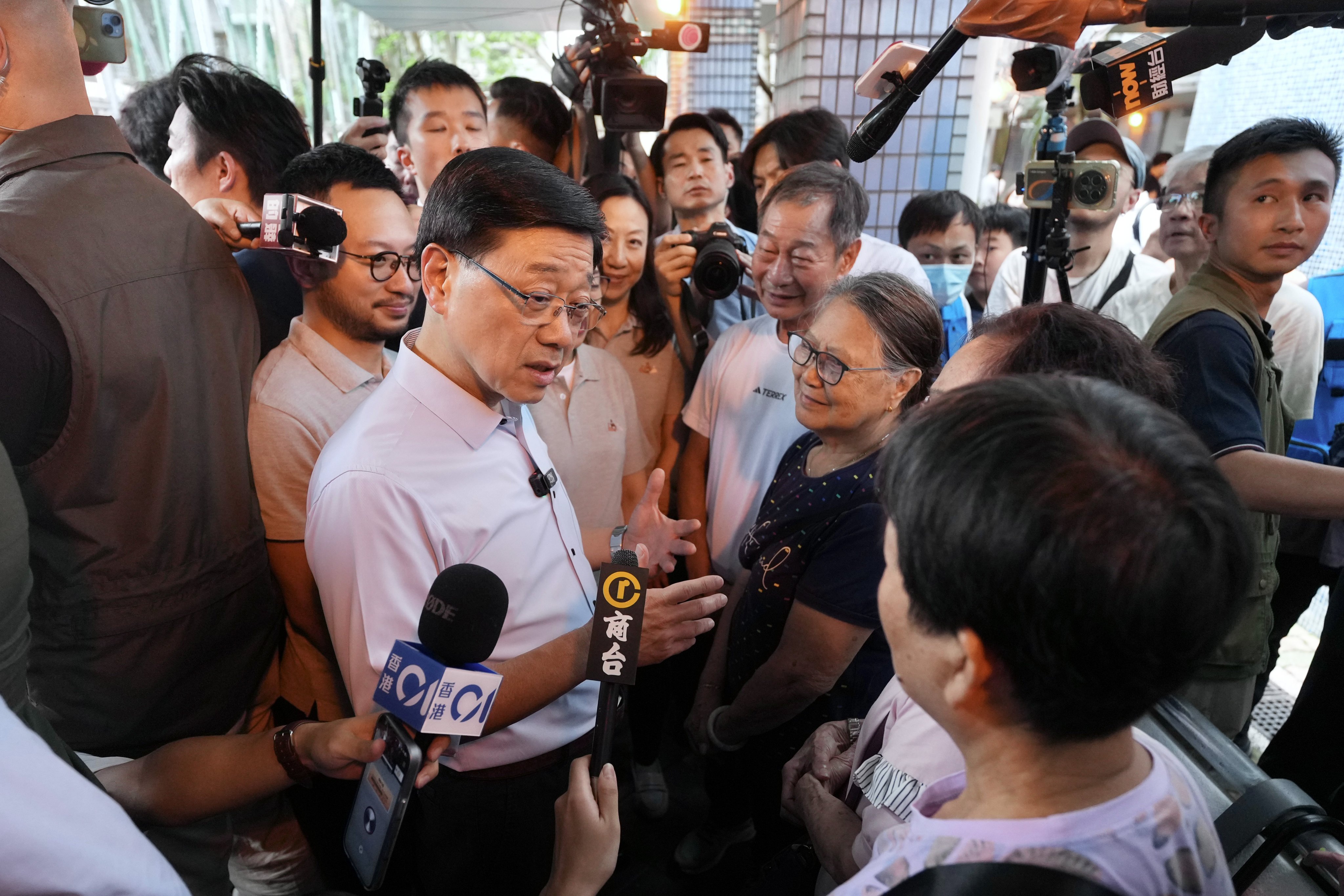 Chief Executive John Lee (centre) made the comment after a visit to Un Chau Estate. Photo: Karma Lo