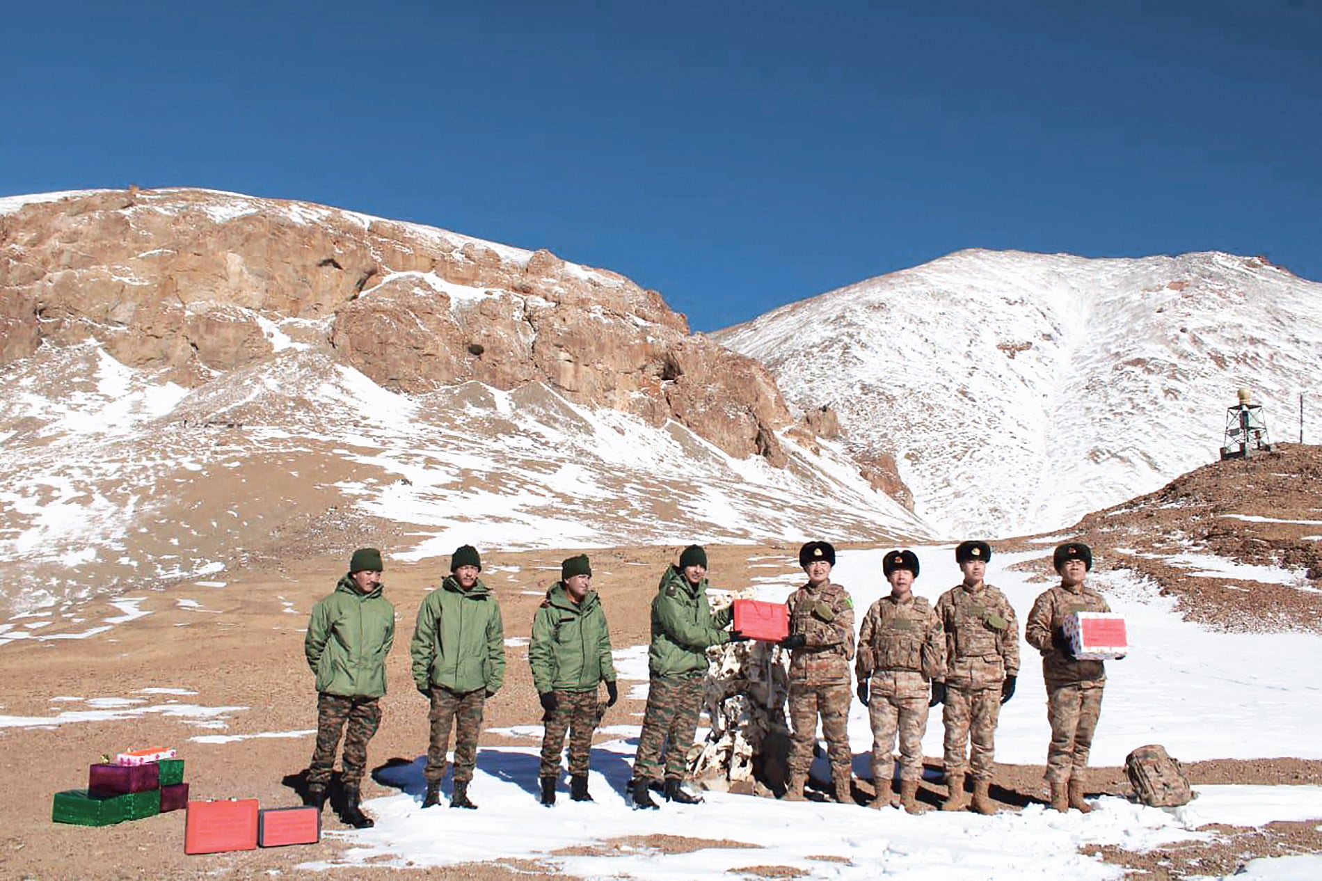 Indian and Chinese troops exchange greetings along the Line of Actual Control in Ladakh on the occasion of the Indian festival of Diwali in October 2024, four years after a deadly border clash. Photo: AFP