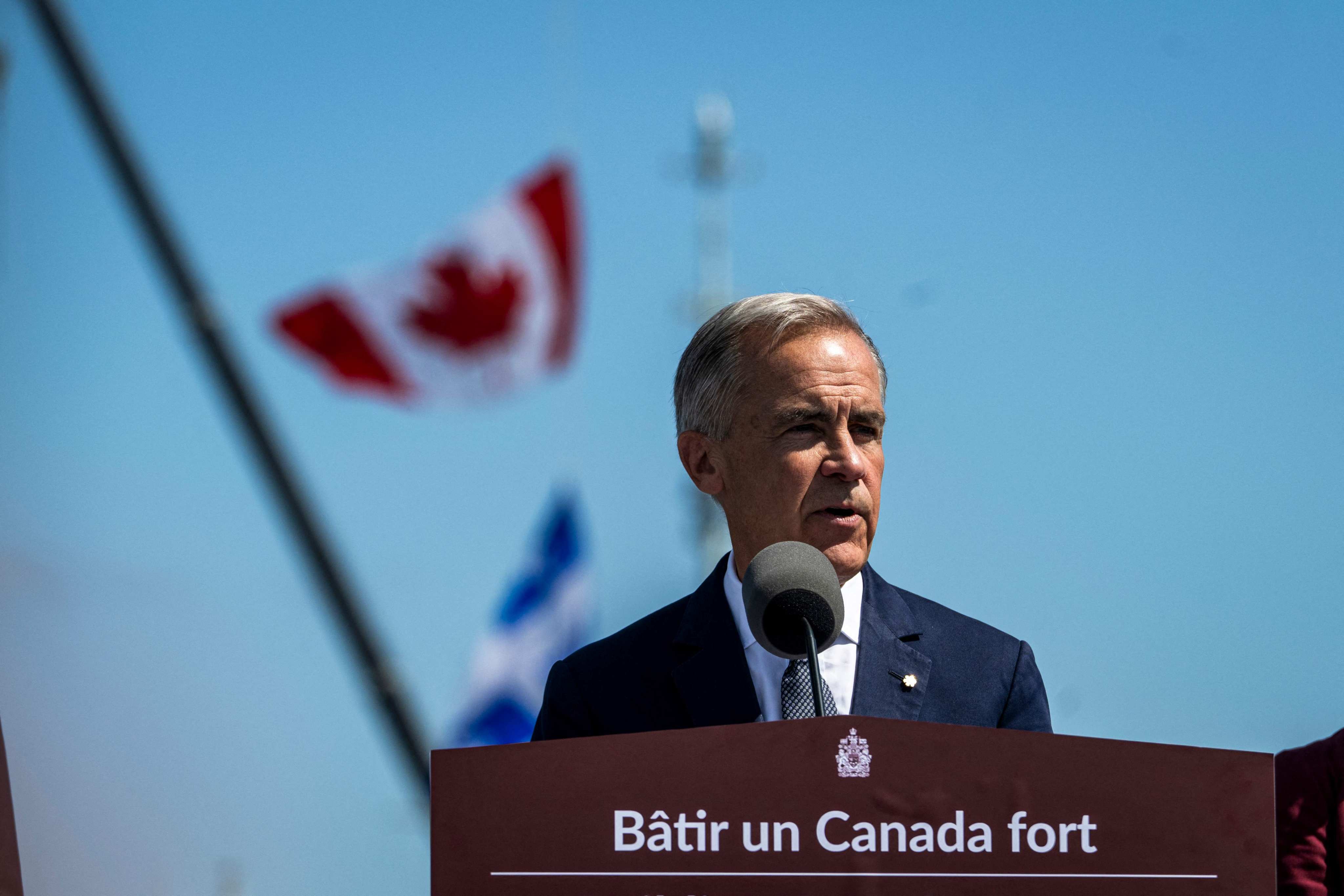 Canadian Prime Minister Mark Carney speaks about the trade dispute with the US in Levis, Quebec, on Monday. Photo: AFP