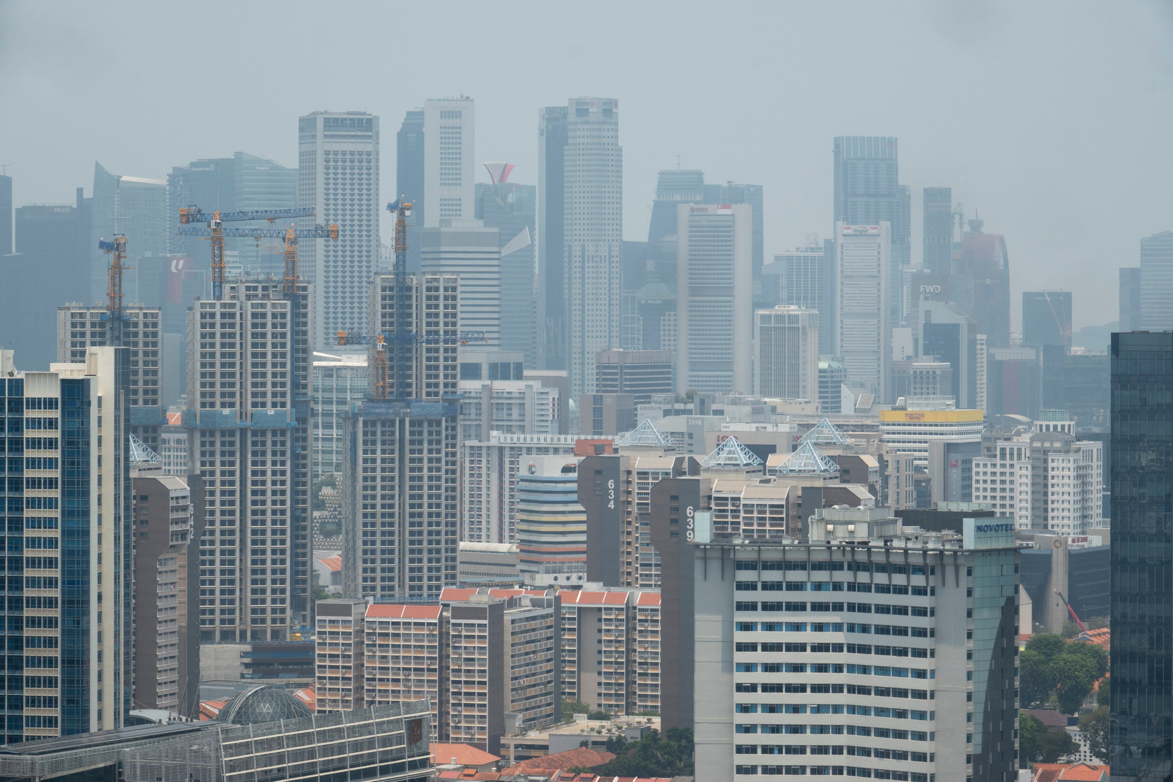 Singapore’s skyline is seen blanketed by haze on Tuesday. Photo: Xinhua