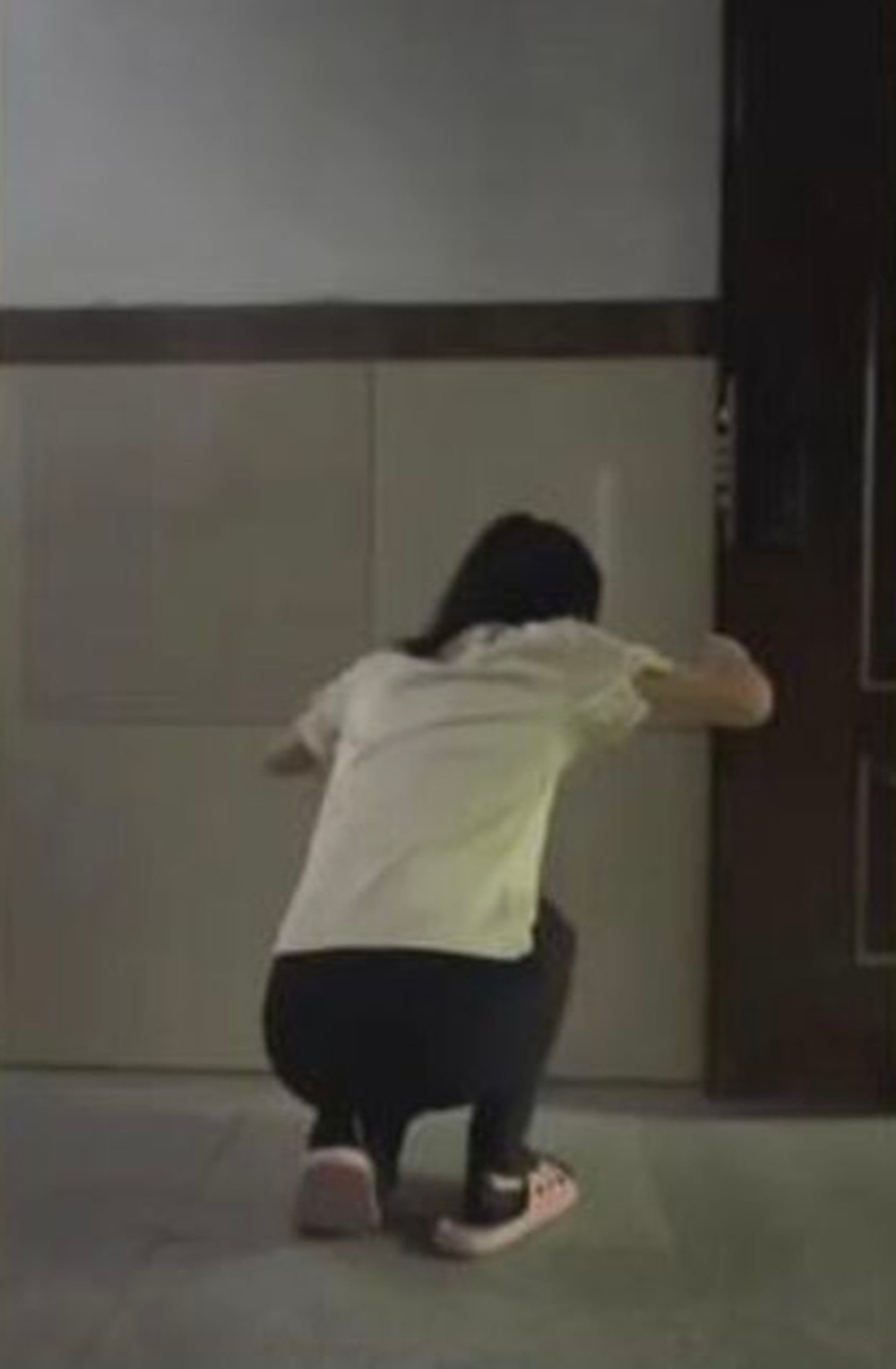 Yang recorded video evidence of herself doing the squats in multiple office locations to send to her supervisor as proof. Photo: Handout