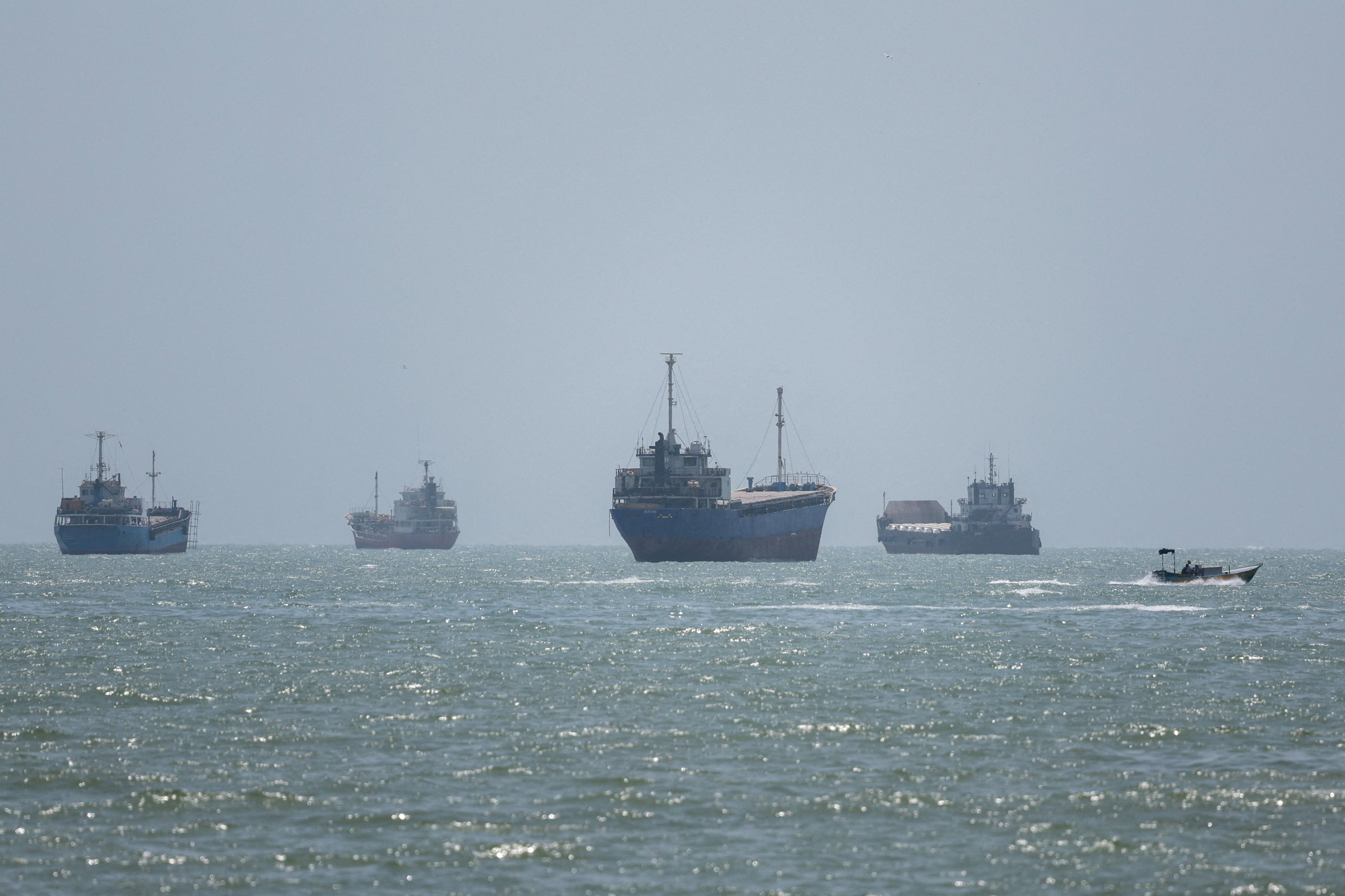 Vessels in the Strait of Hormuz are seen near the beach of Bandar Abbas, Iran, on Wednesday. Photo: WANA via Reuters