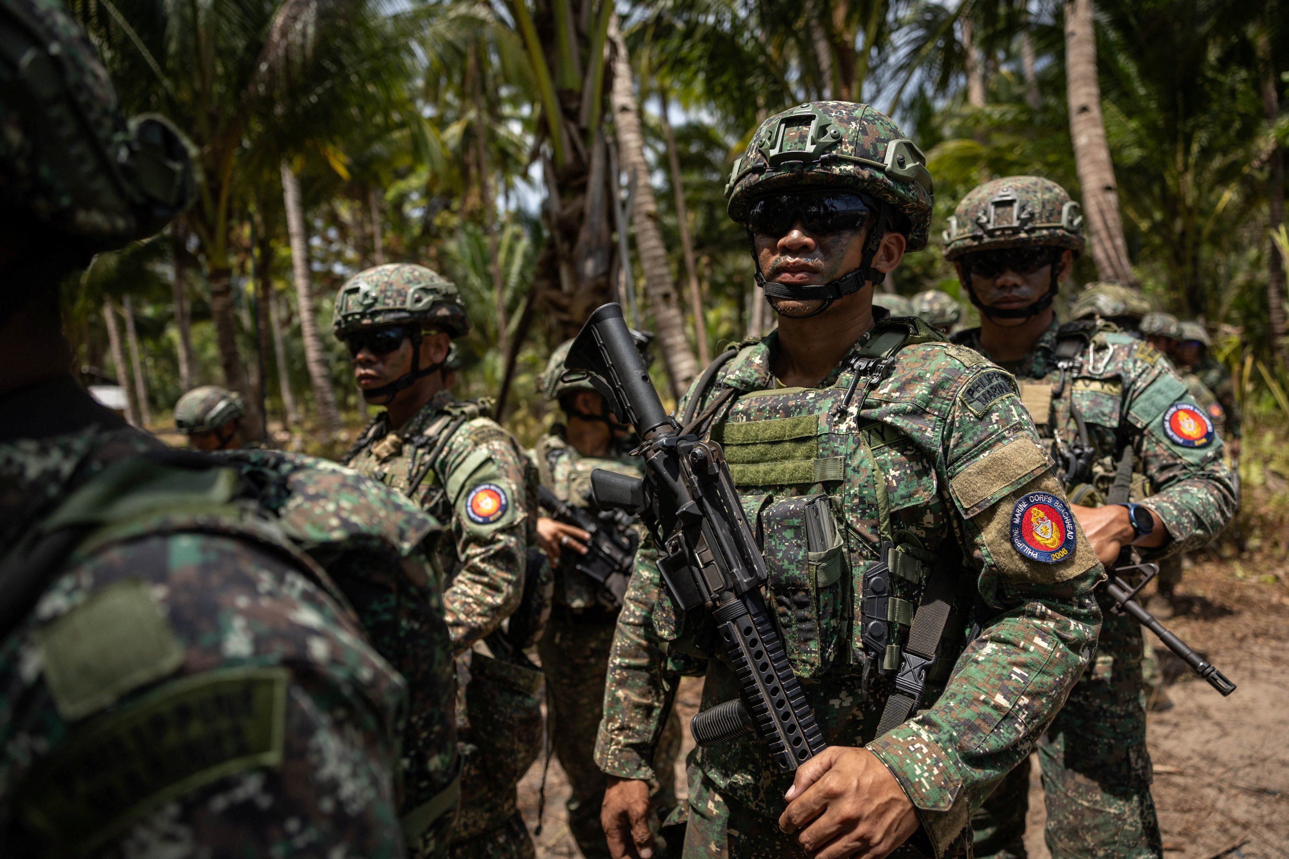 Philippine troops participate in live‑fire exercises in Barangay Aporawan, Aborlan, Palawan, during the Balikatan joint military drills between the US and the Philippines in April. Photo: Reuters