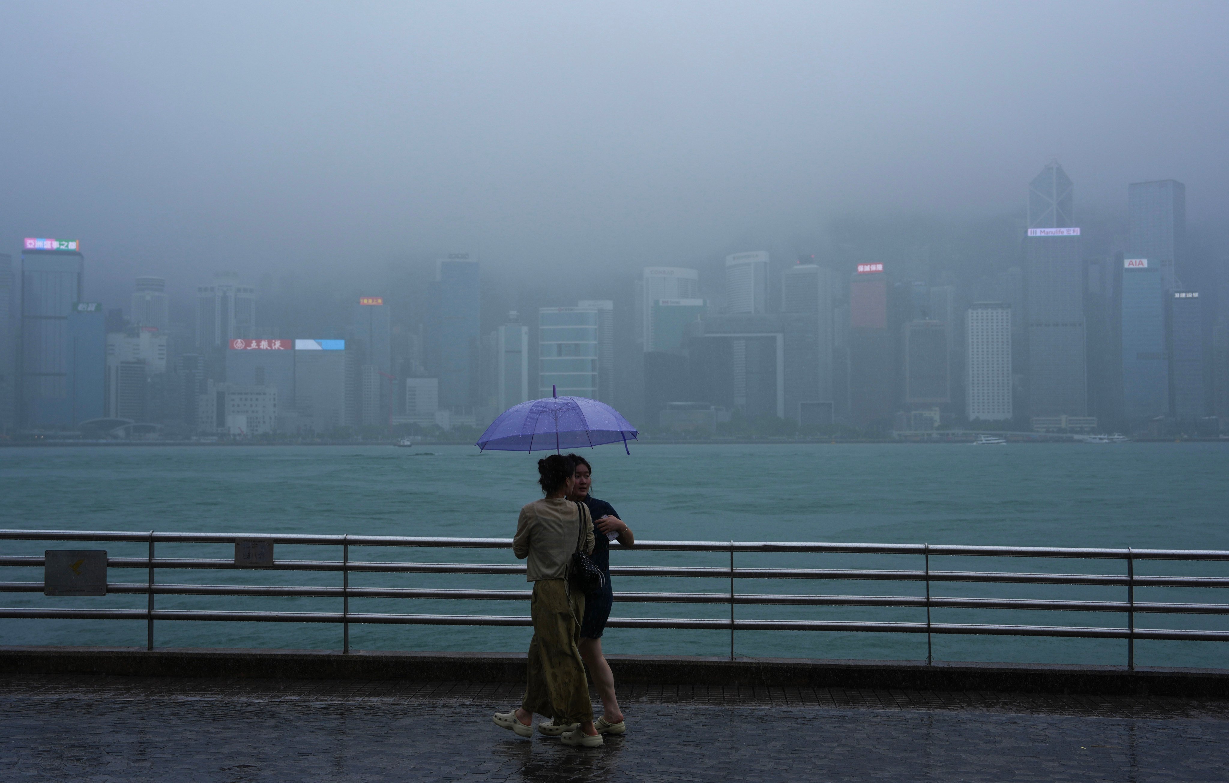 Rainy weather at the Victoria Harbour waterfront in Tsim Sha Tsui. Photo: Sam Tsang