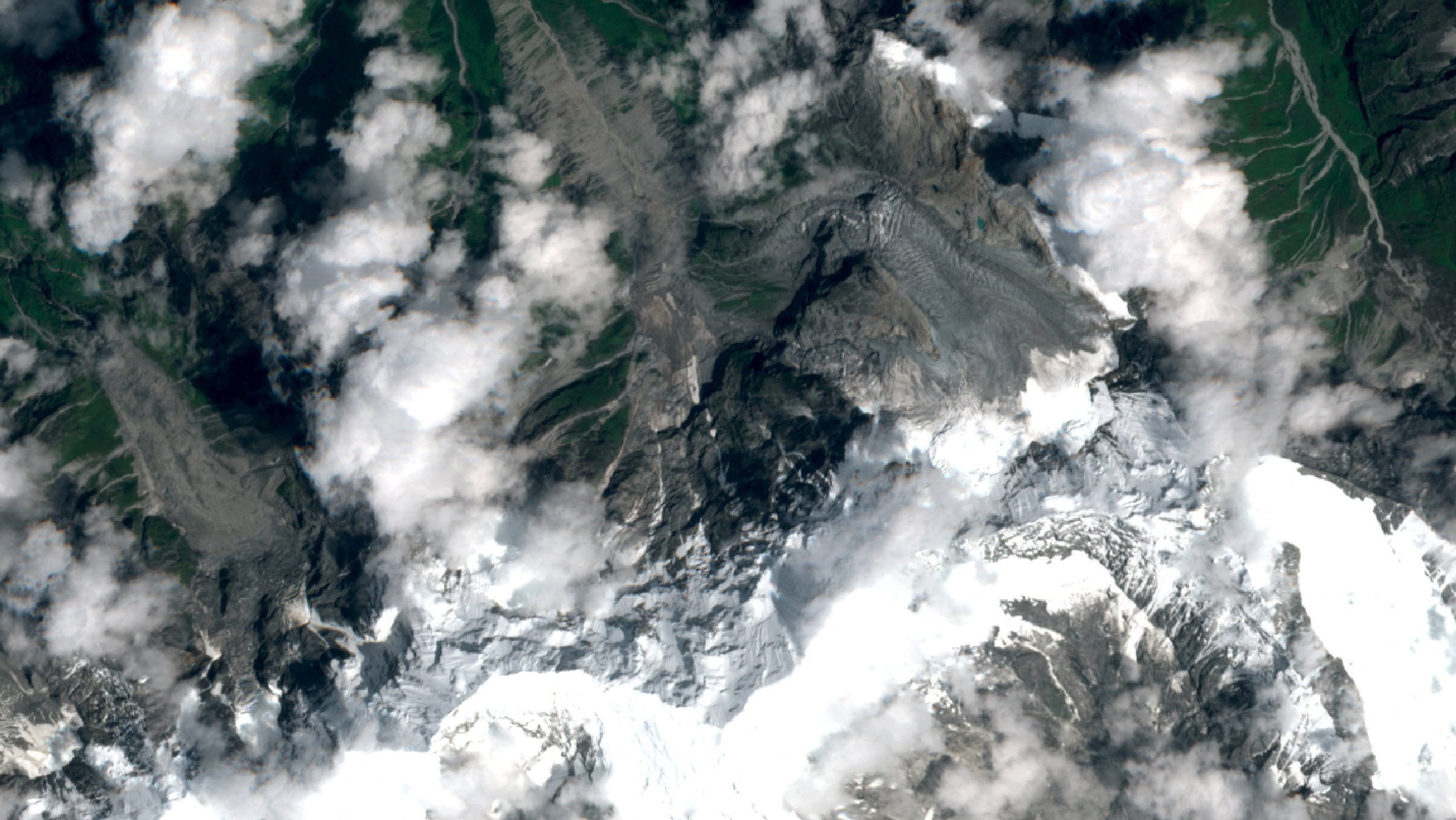 A satellite view of glaciers in Langtang, Nepal. Temperatures in the Himalayas are rising at more than twice the global average. Photo via Reuters