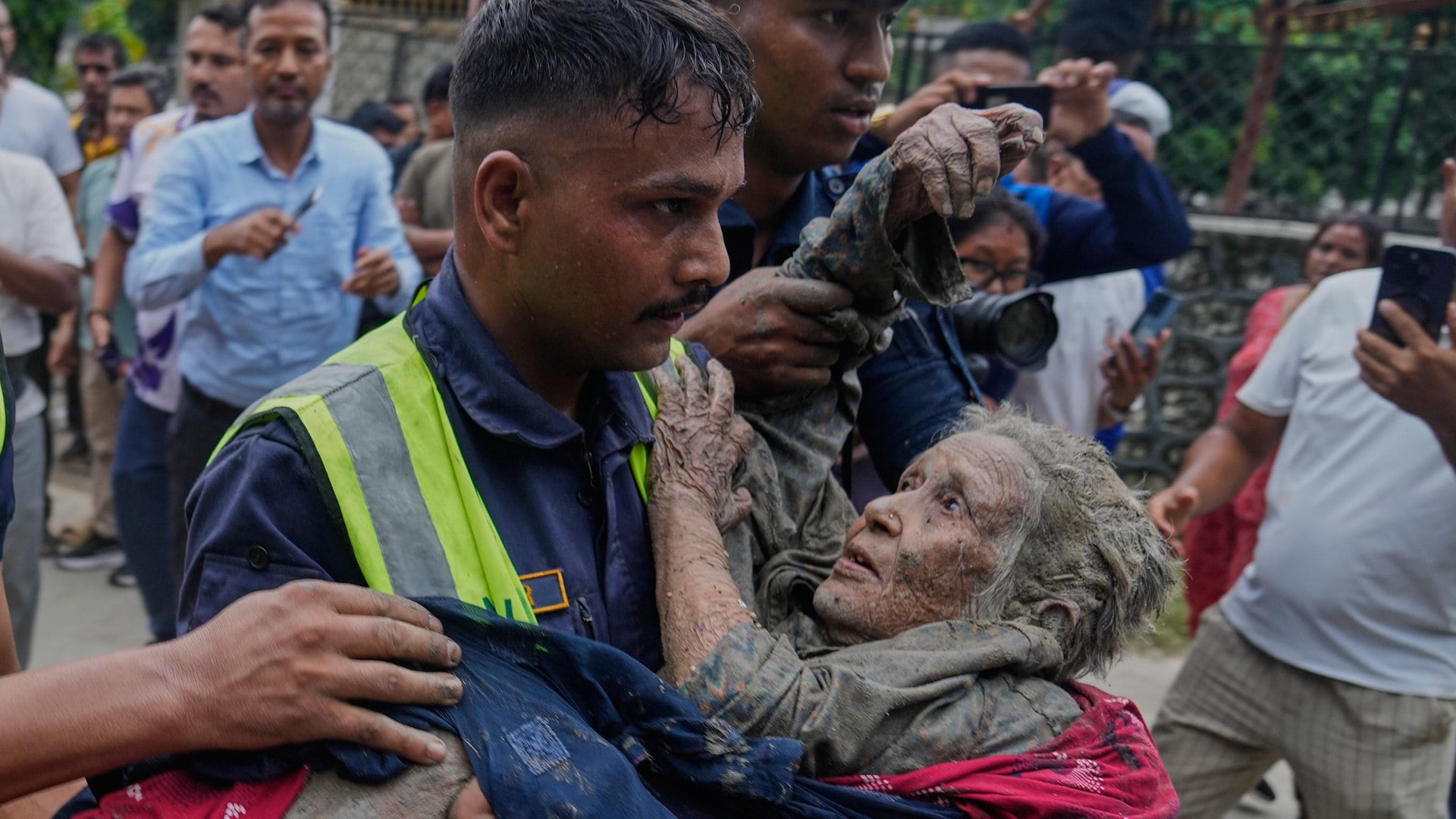 Scores are dead and hundreds are missing after landslides and flash floods swept through villages in the Himalayan region