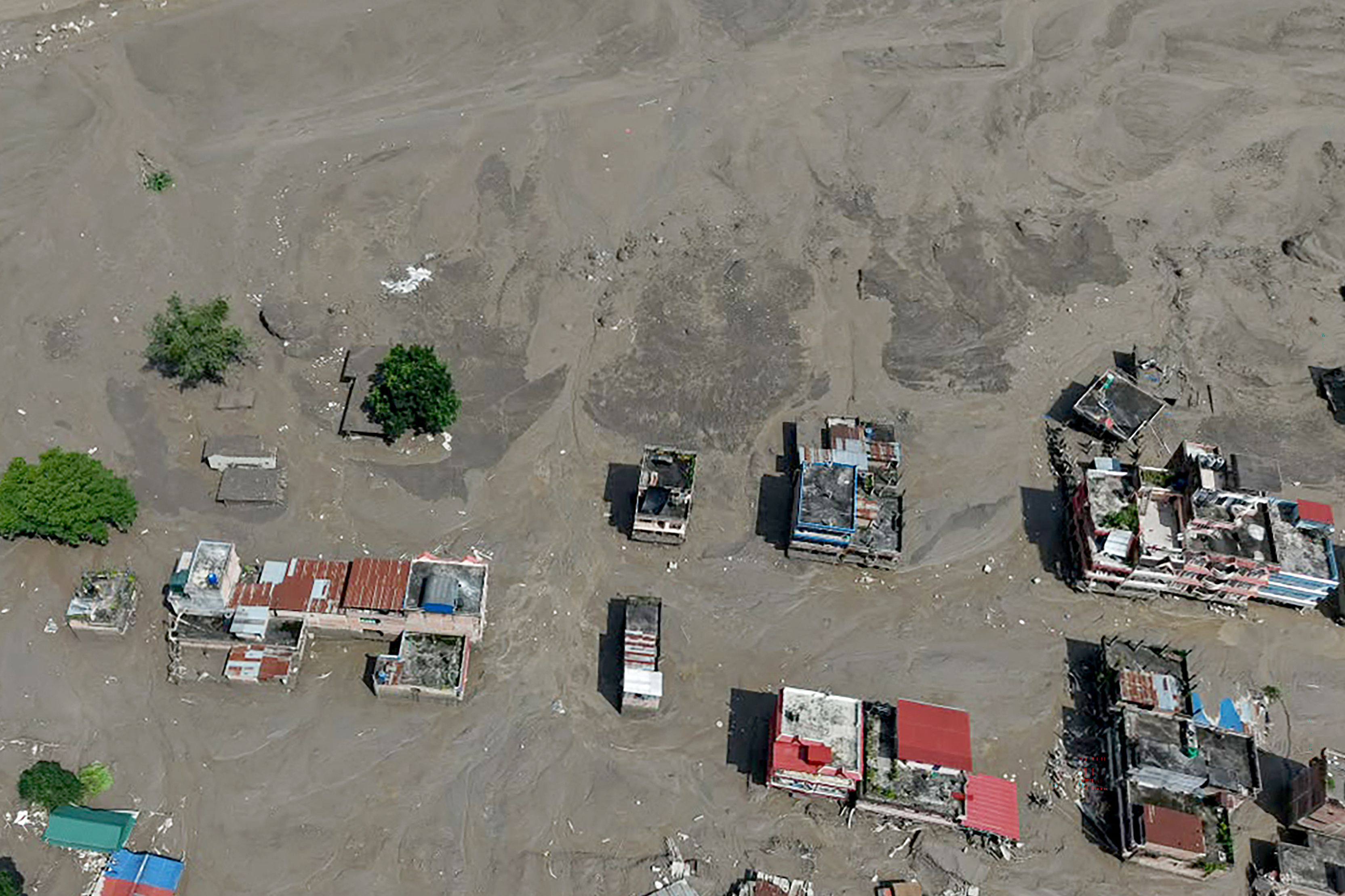An aerial view of flash floods at Trishuli Bazar in Nepal’s Nuwakot district on August 26, 2026. Chinese state media reported “major casualties” from a mudslide at a Tibet trade hub on China’s side. Photo: AFP