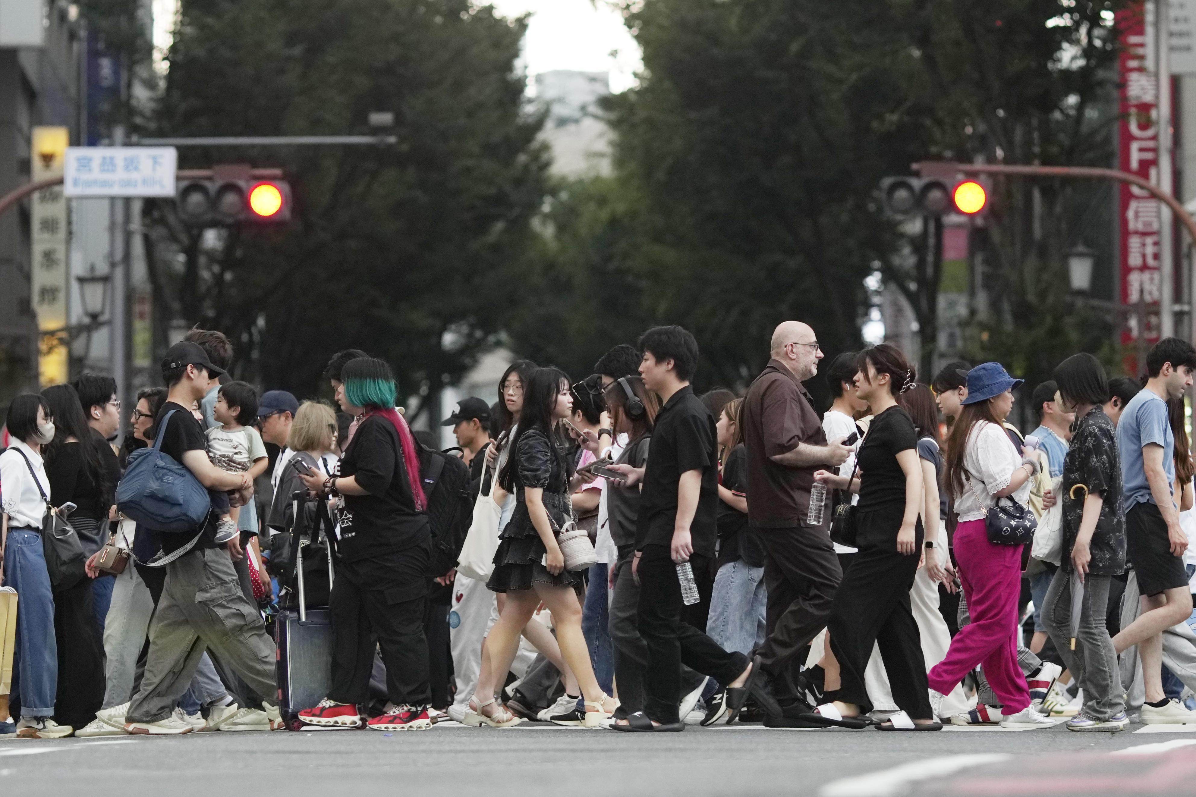 People walking in Tokyo’s Shibuya area. Japan will require about 2.72 million care workers by financial year 2040, according to Ministry of Health, Labour and Welfare estimates. Photo: Kyodo