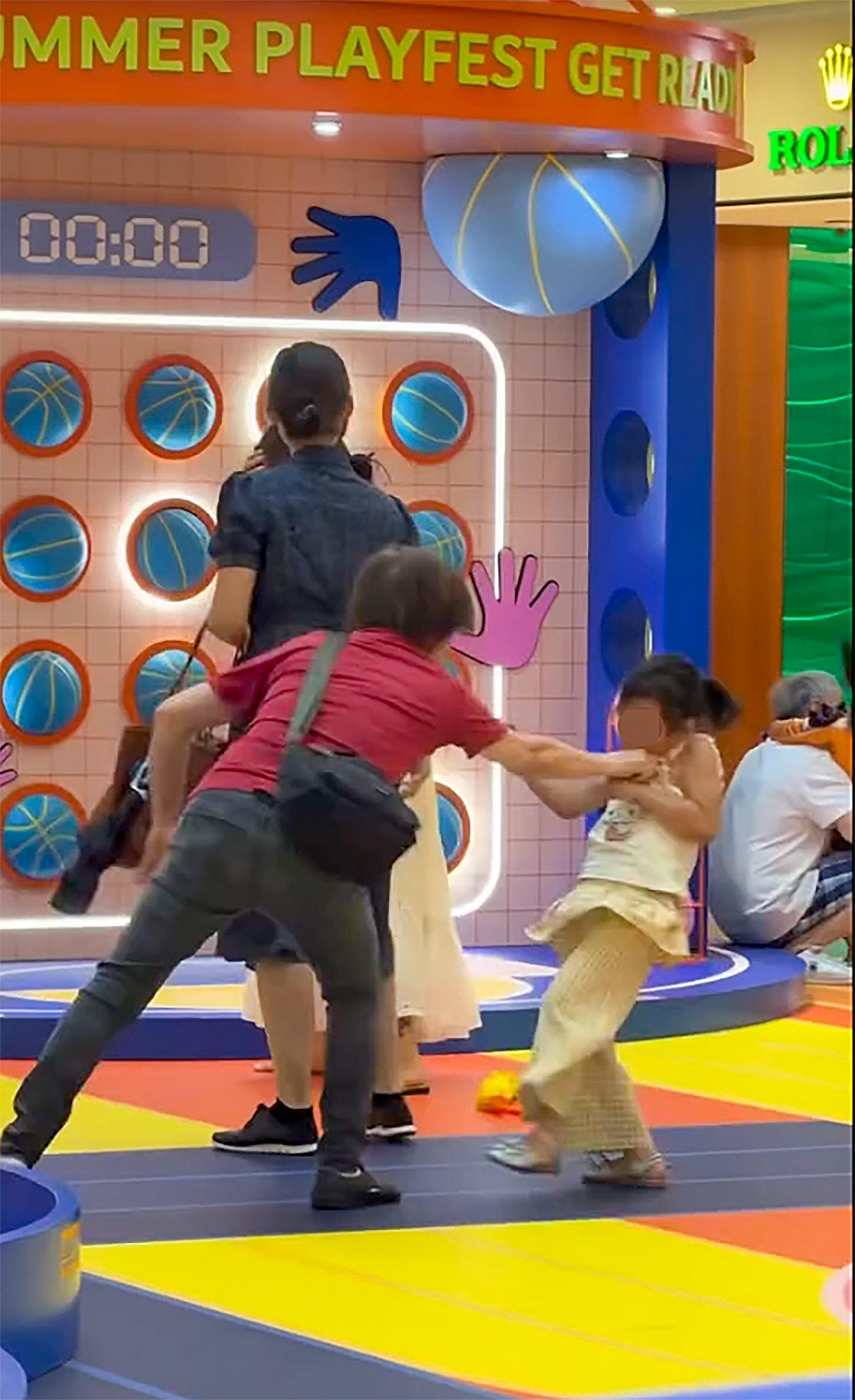 Viral footage shows an older woman shoving a girl and then slapping her, causing the child to fall to the ground. Photo: Threads/one_mushroooom