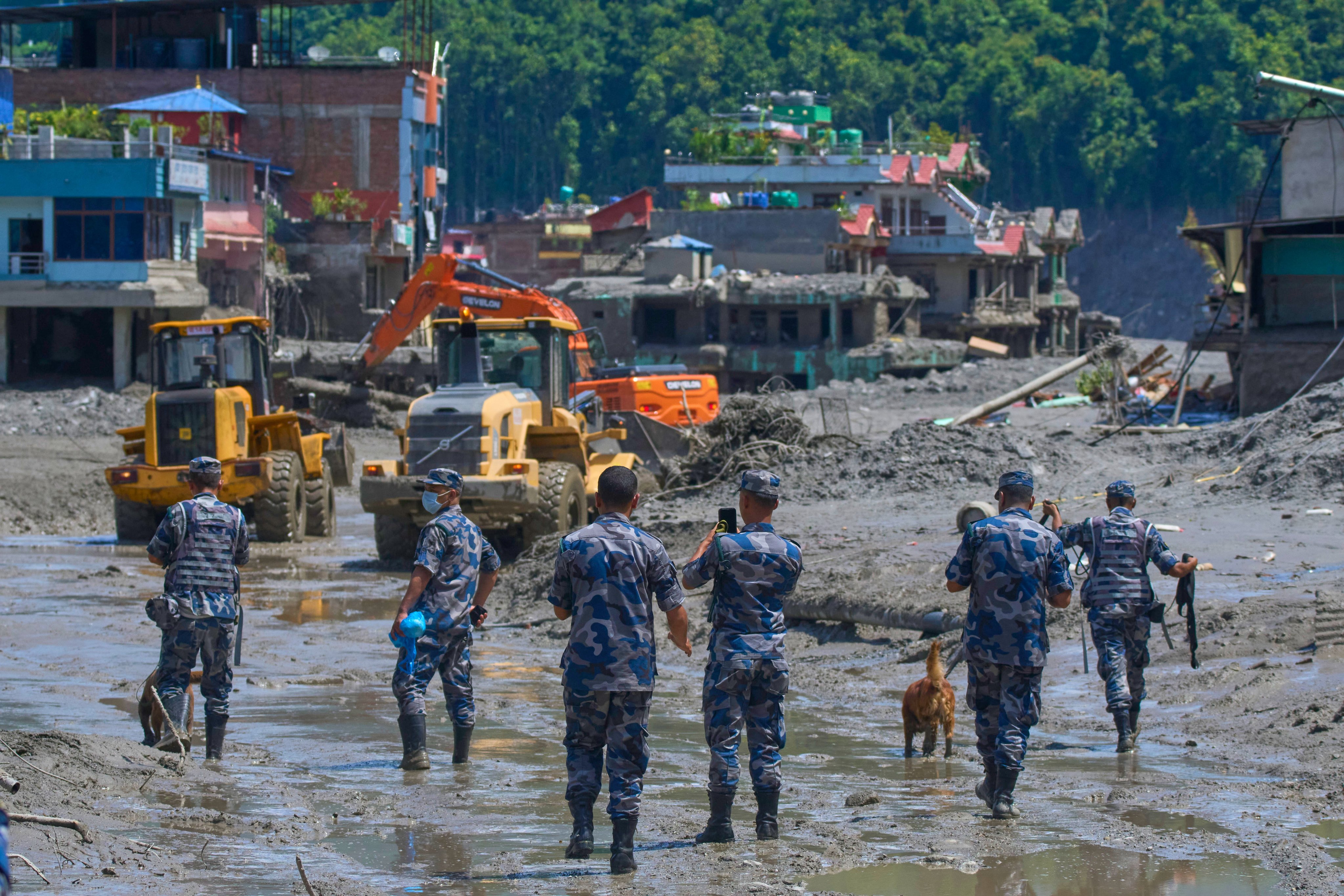 Deadly China-Nepal border mudslide and flash flood kills over 160, leaves hundreds missing. Photo: AFP
