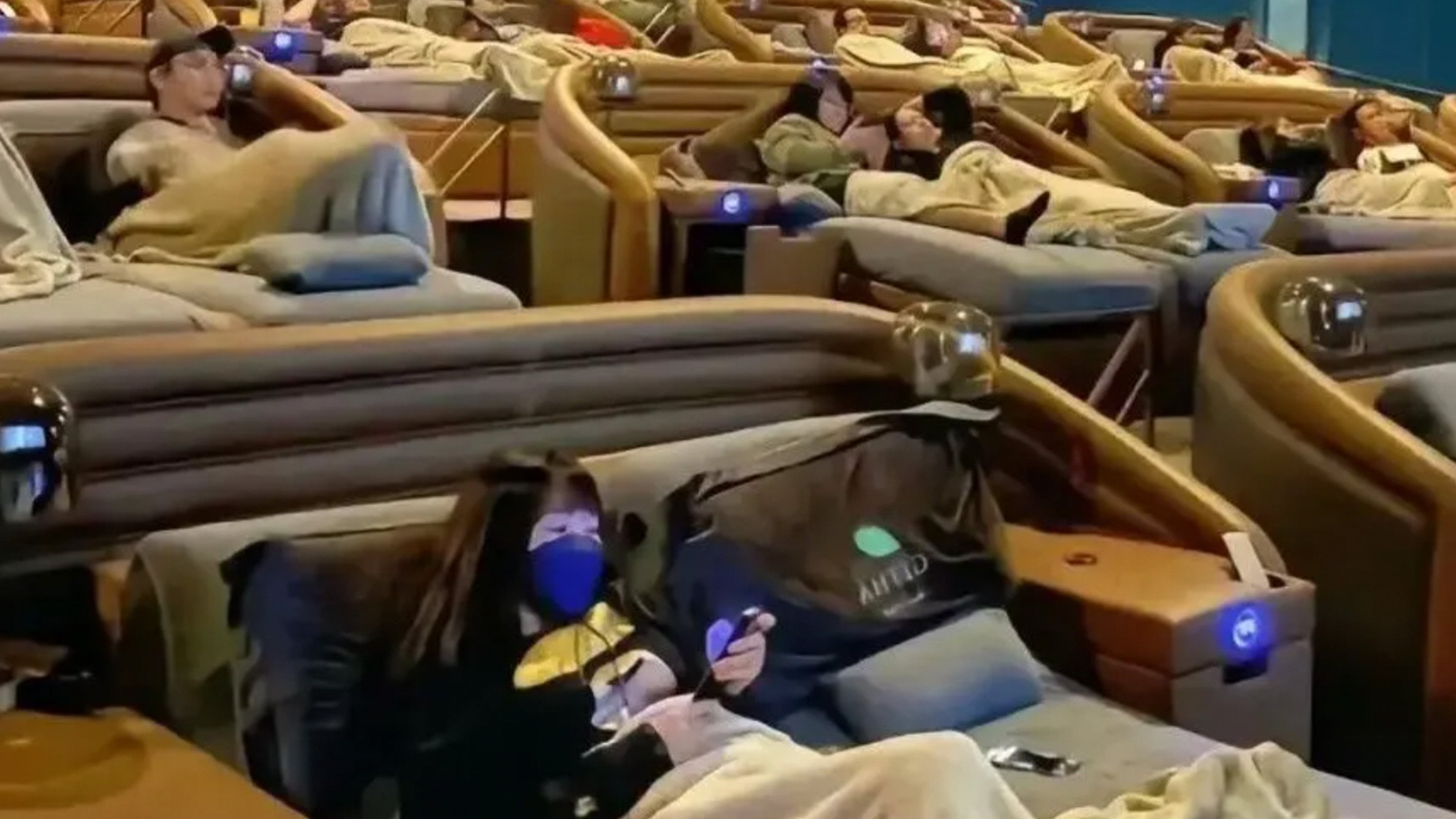 A cinema in Xian has launched a midday nap service, offering fully reclinable seats to boost business during the low-traffic lunchtime hours. Photo: RedNote
